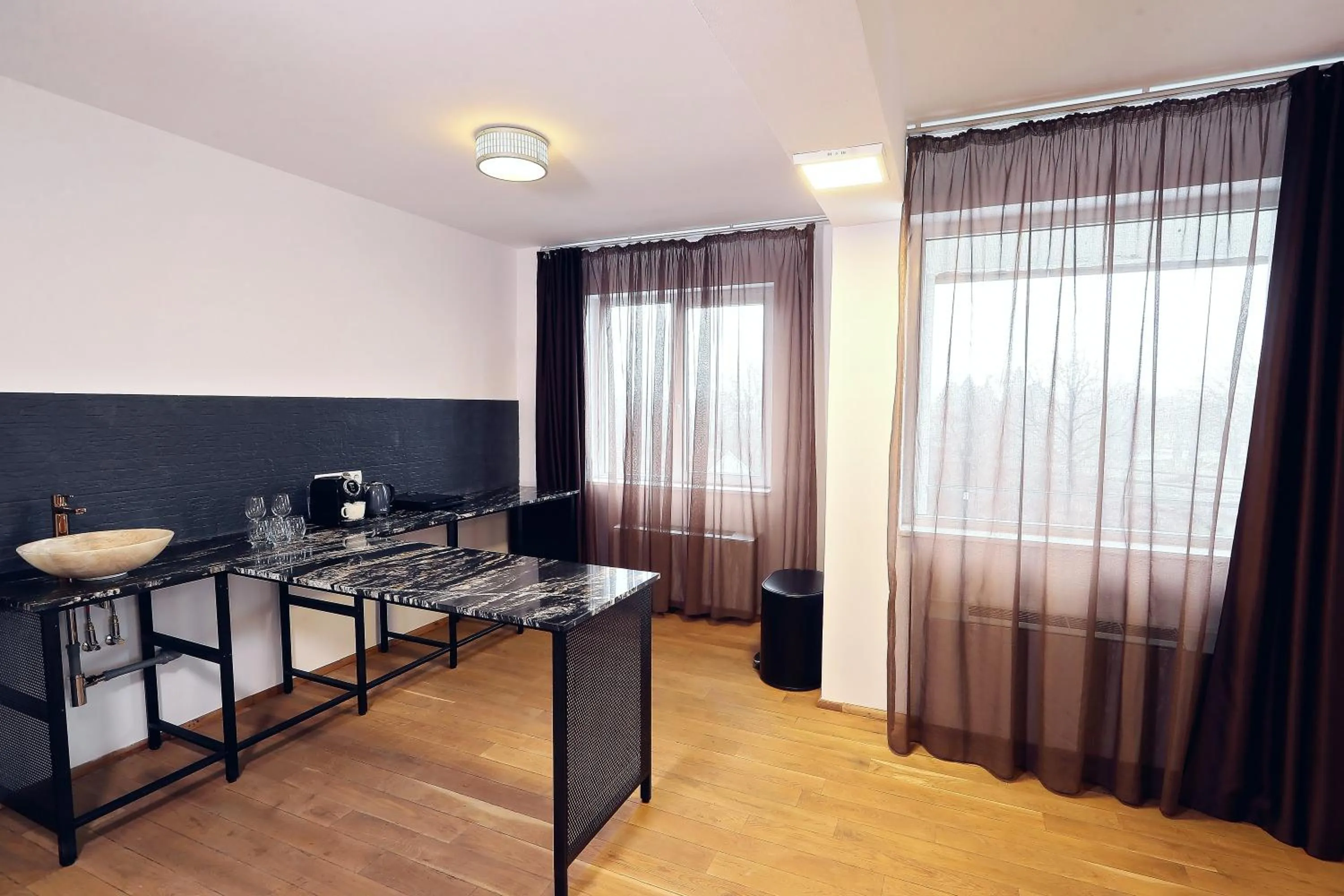 Kitchen or kitchenette in Living In Aparthotel