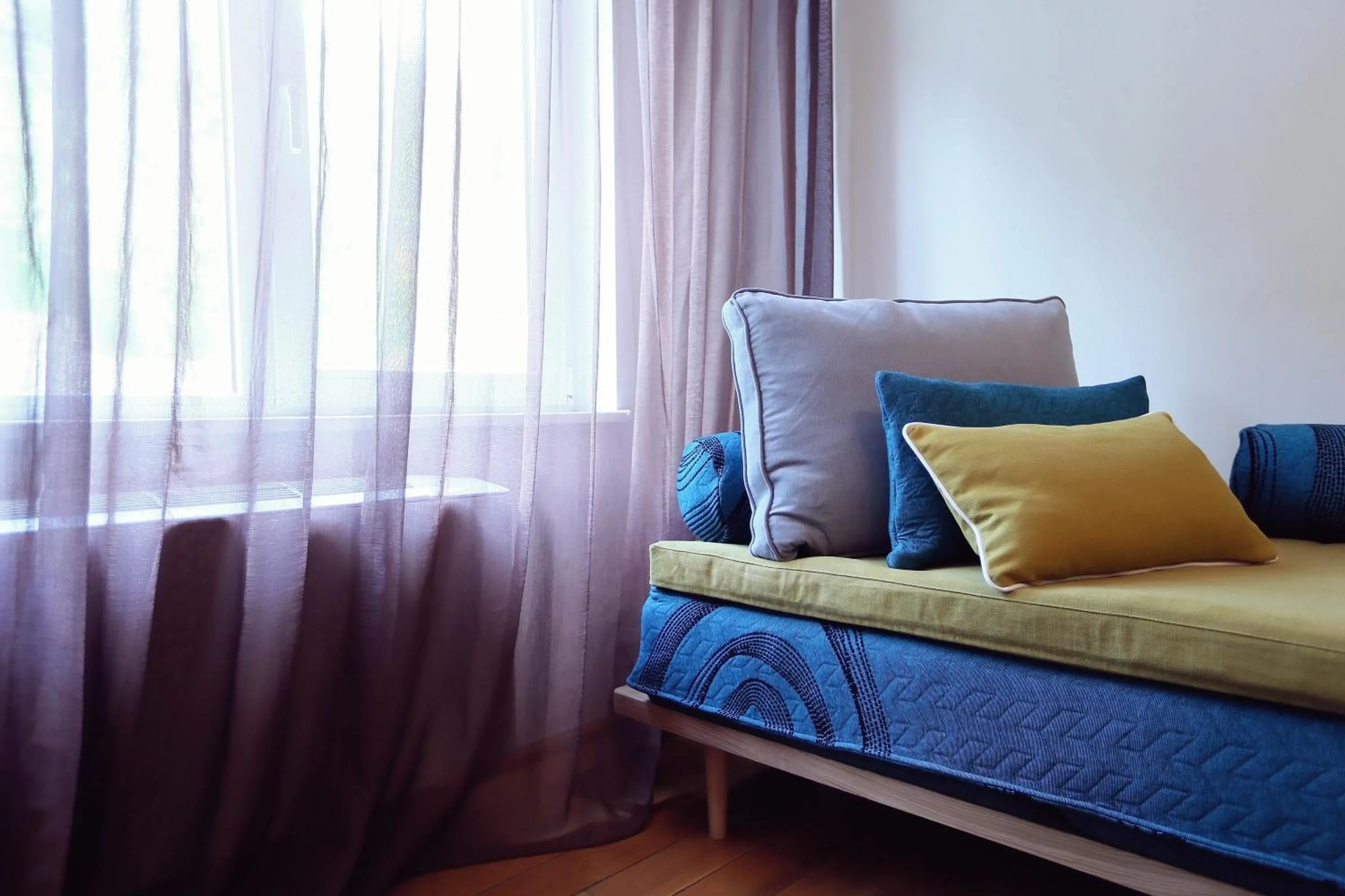 Bed in Living In Aparthotel