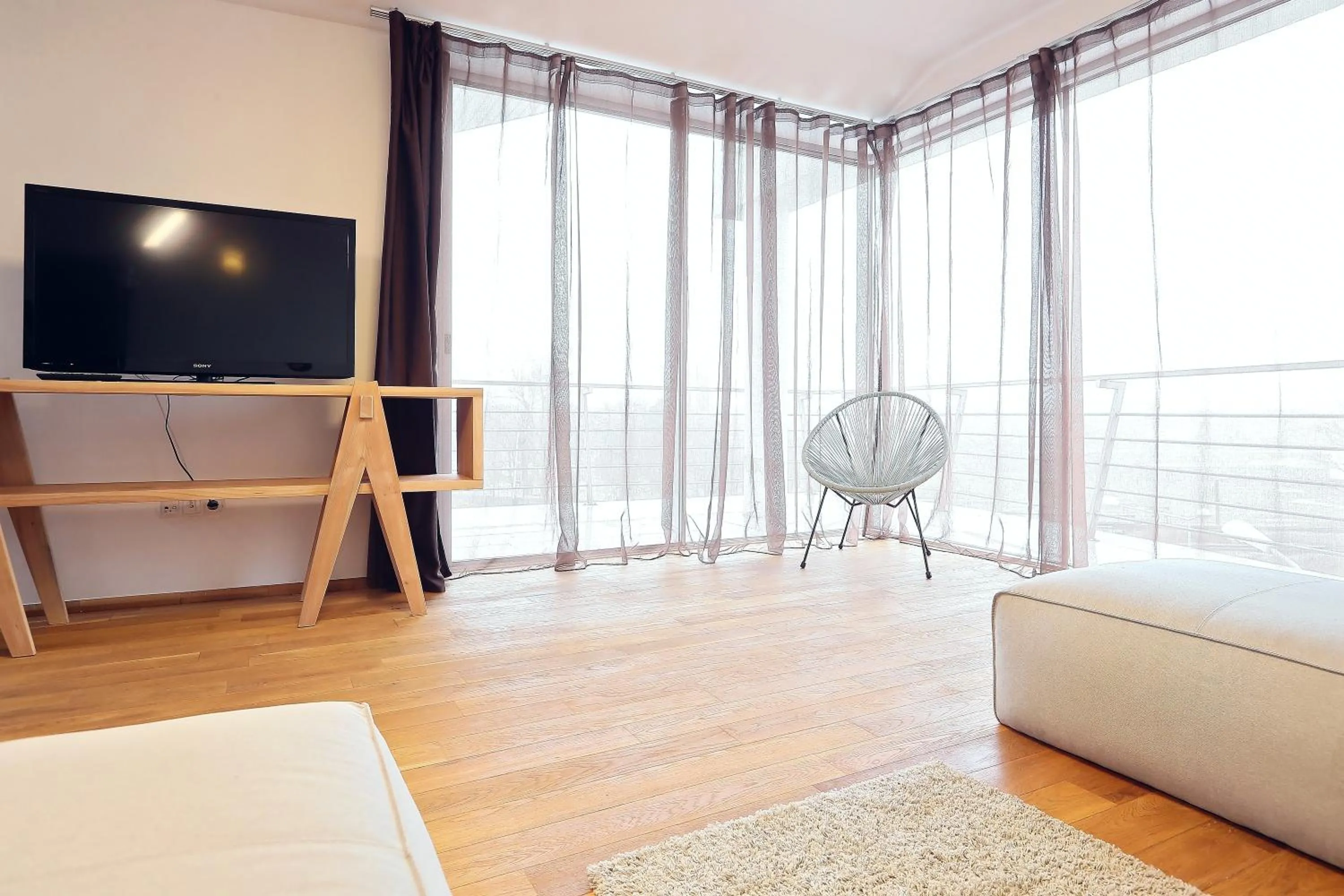 Living room, Bed in Living In Aparthotel