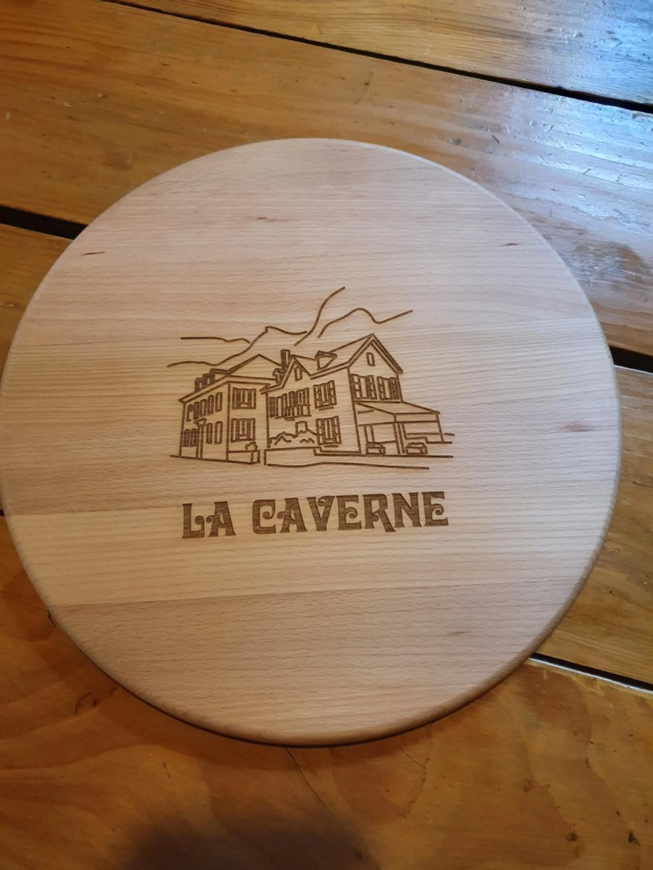 Property logo or sign in Auberge La Caverne