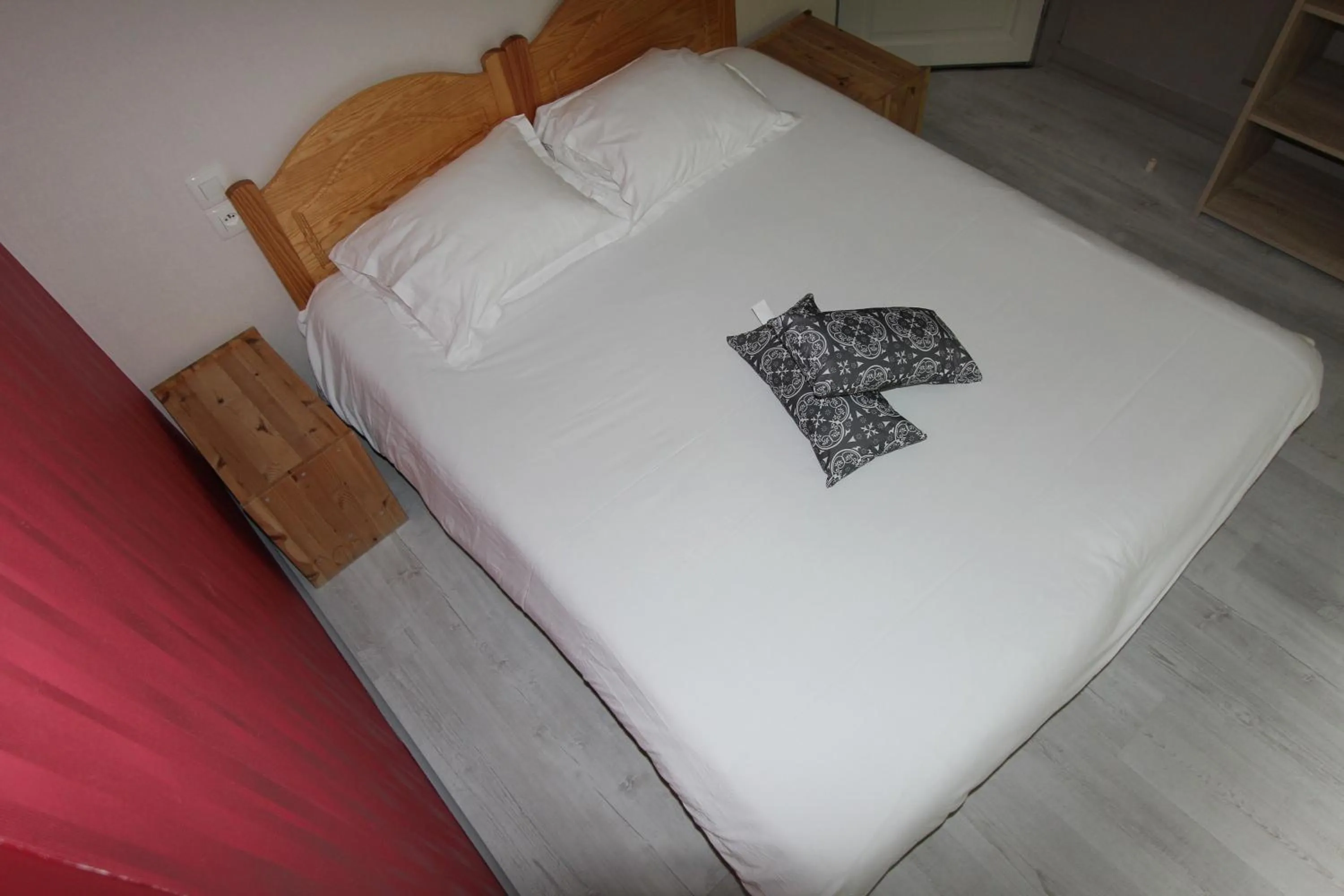 Bed in Auberge La Caverne