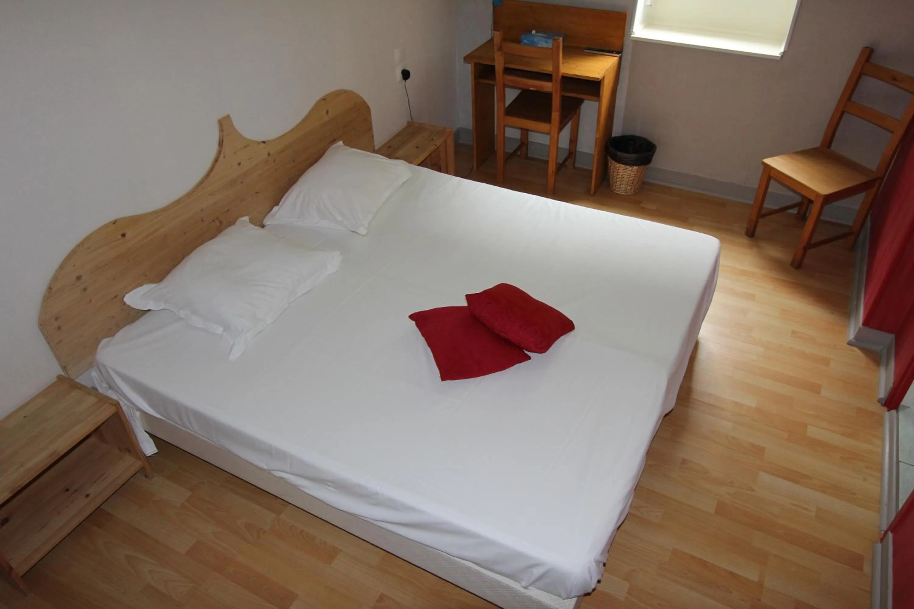 Bed in Auberge La Caverne