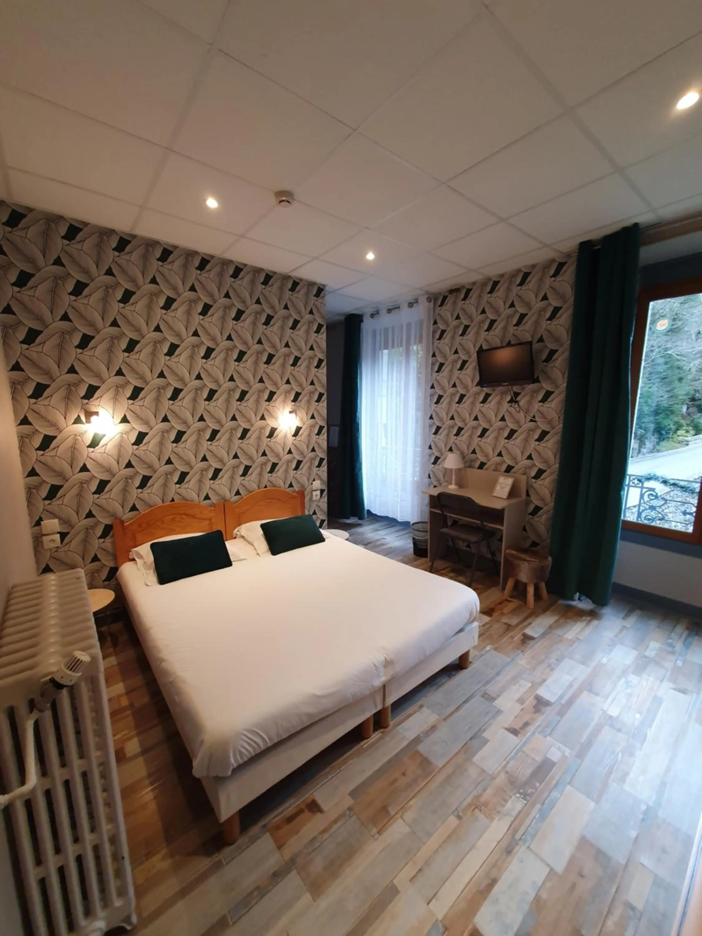 Bed in Auberge La Caverne