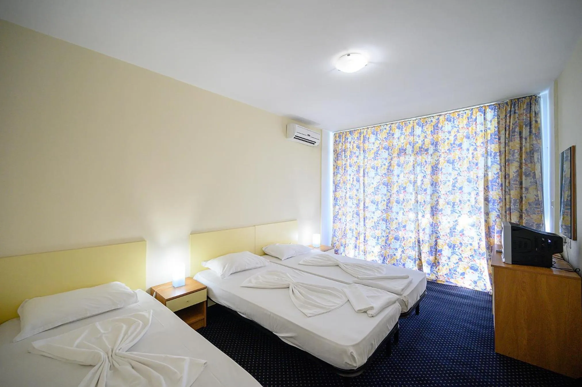 Bed in International House of Journalists Resort