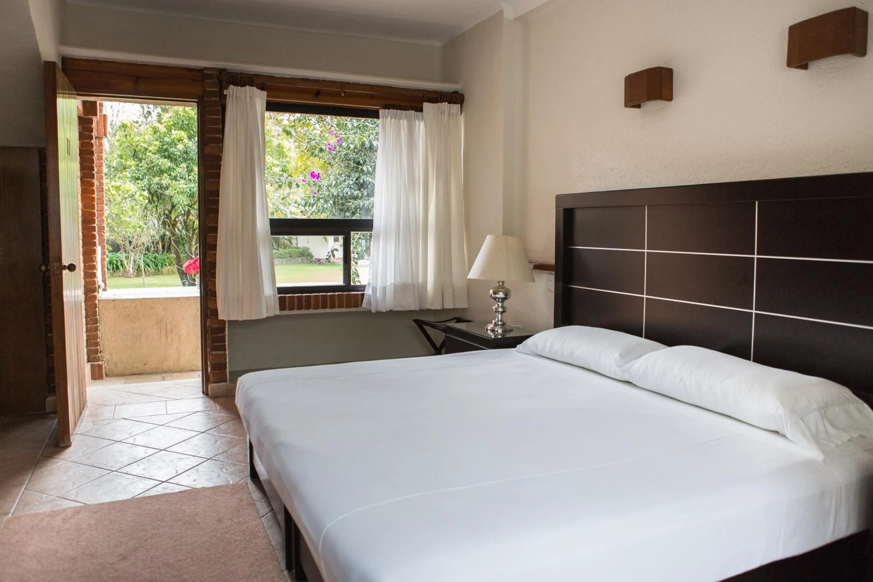 Bedroom, Bed in Casa Bugambilia, Un Pequeño Hotel en Tepoztlán