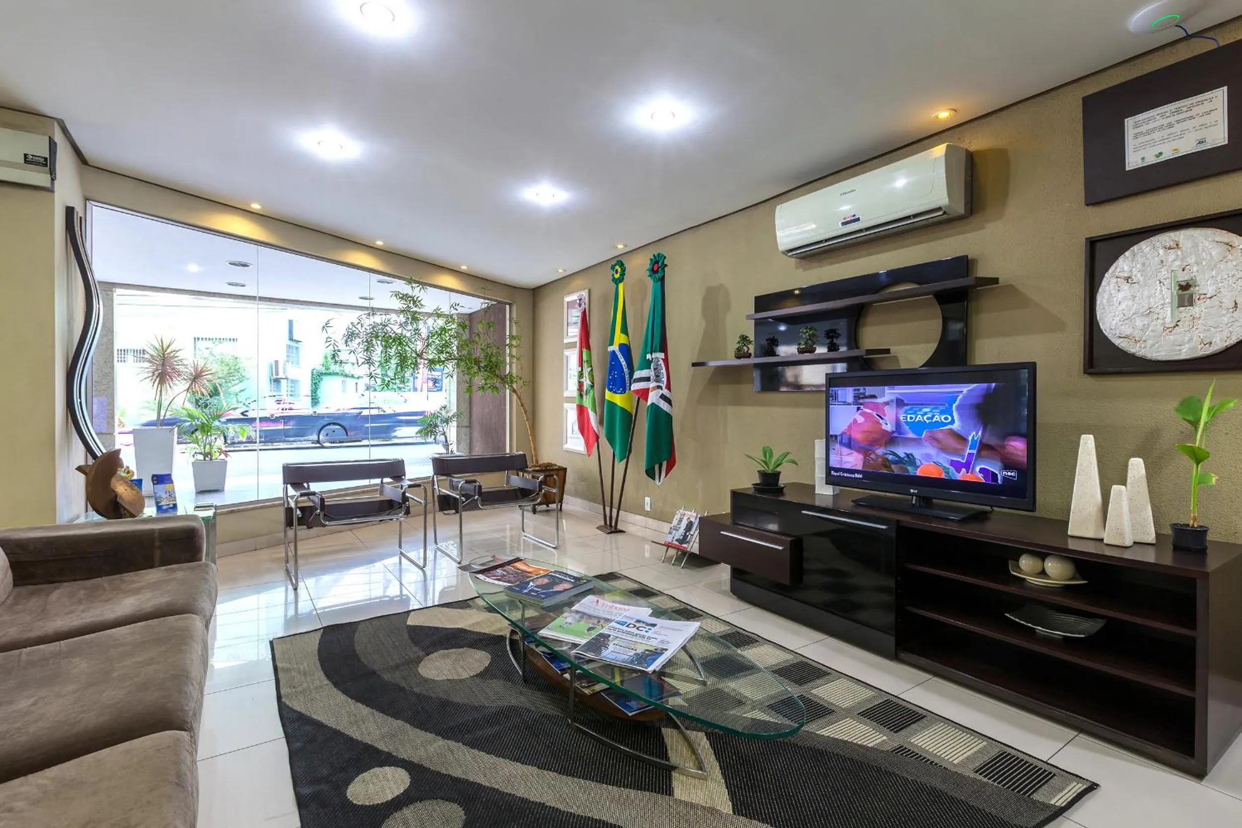 Lobby or reception in Tri Hotel Criciúma