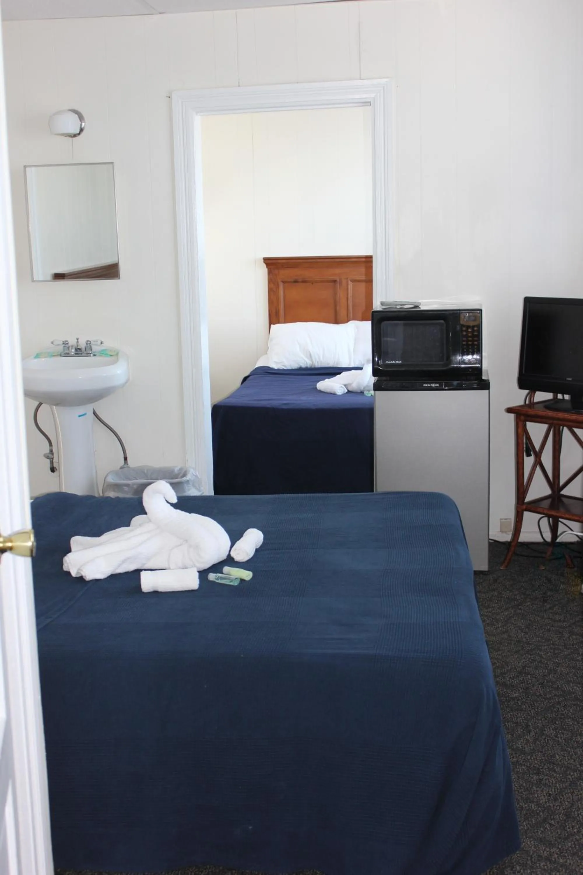 Bed in Blue Water Inn