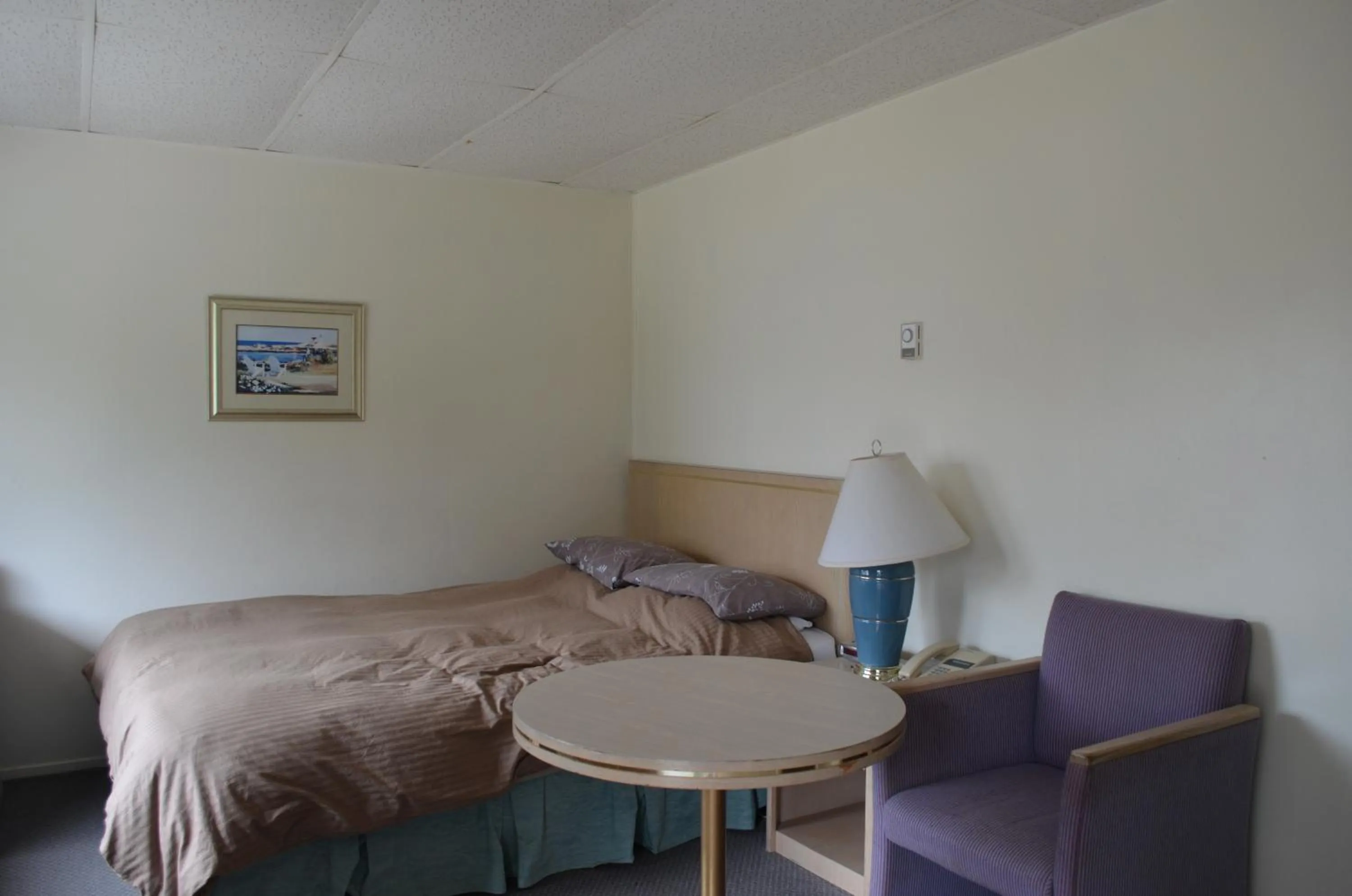 Bed in Seaside Villa Motel & RV Park