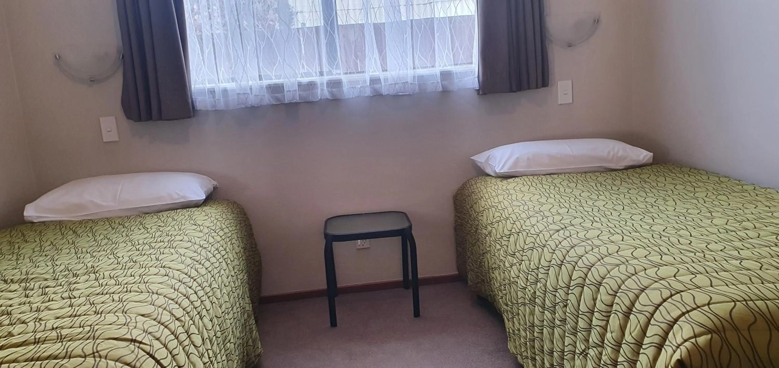 Bed in Ashburton's Regency Motel
