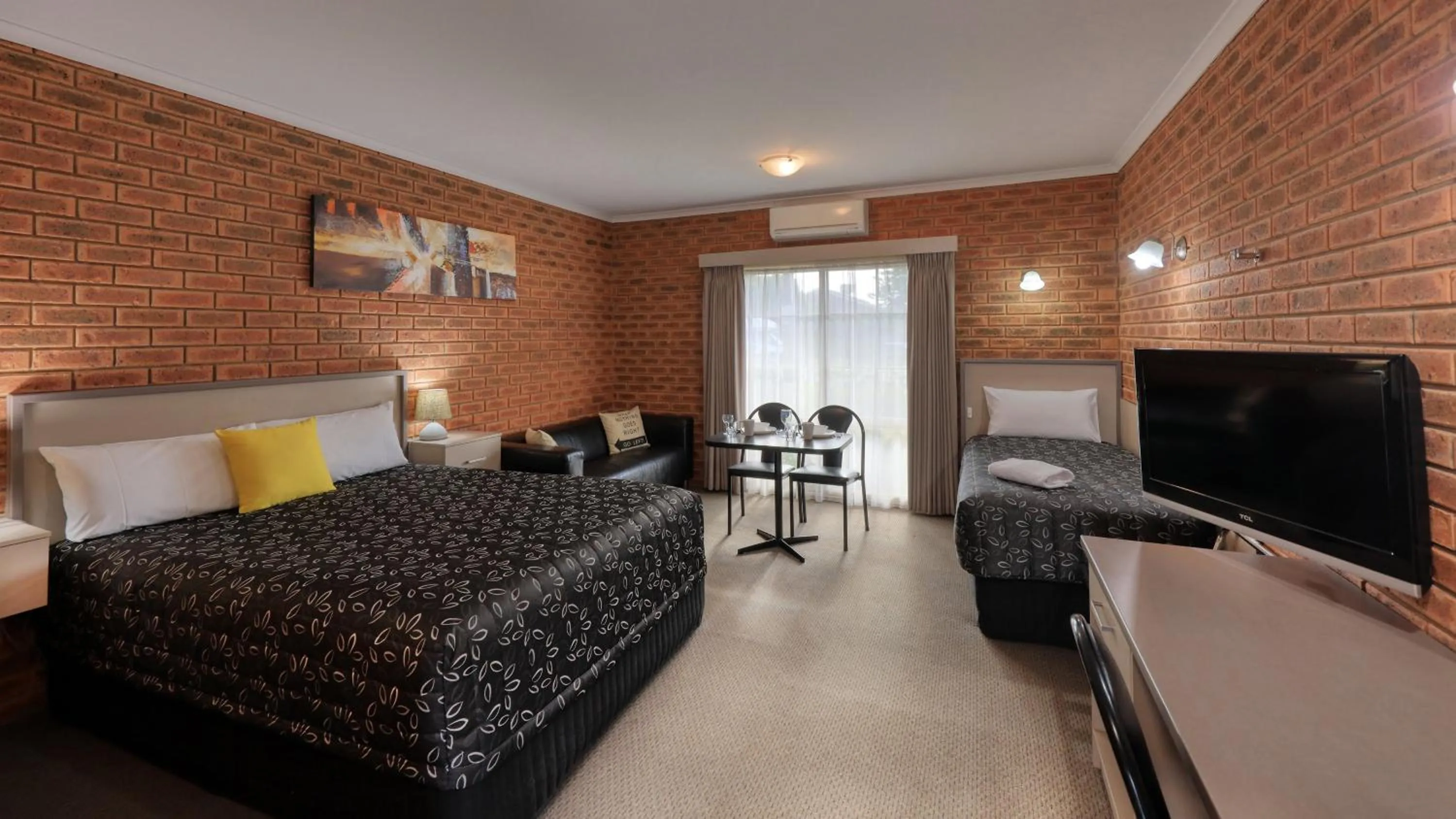 Bed in Glider City Motel Benalla