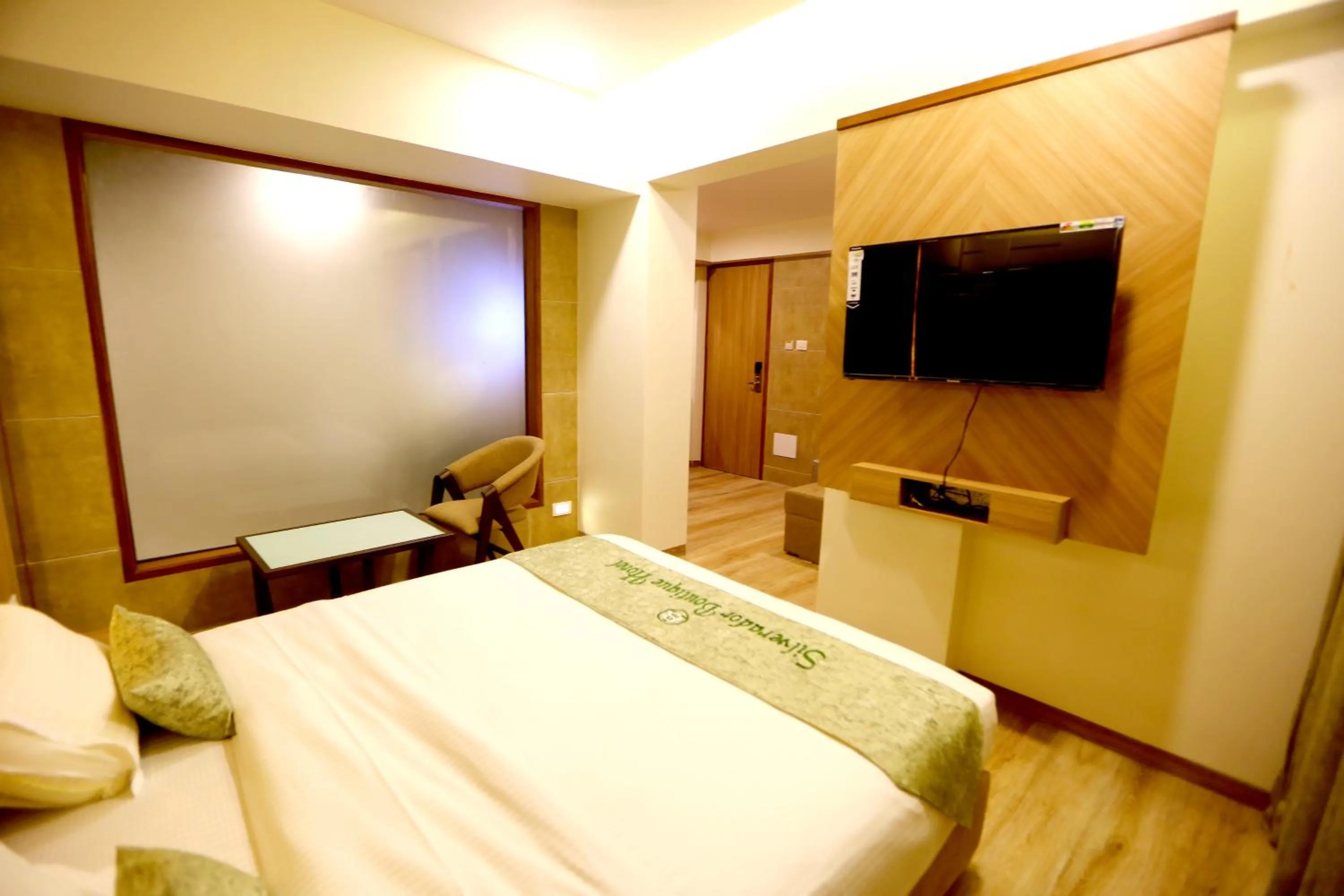 Bed in Silverador Boutique Hotel