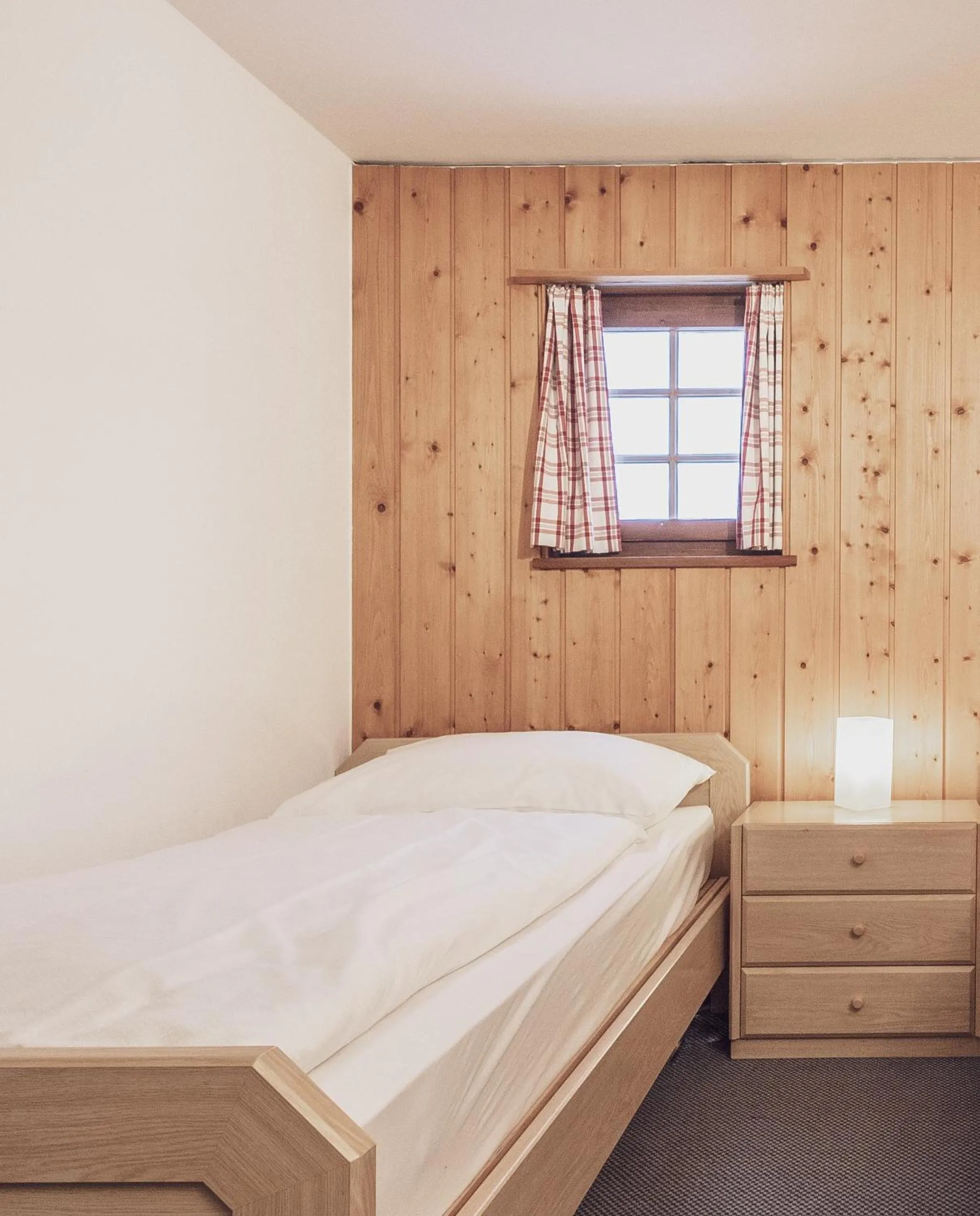 Bed in Davoser Hüsli by Mountain Hotels