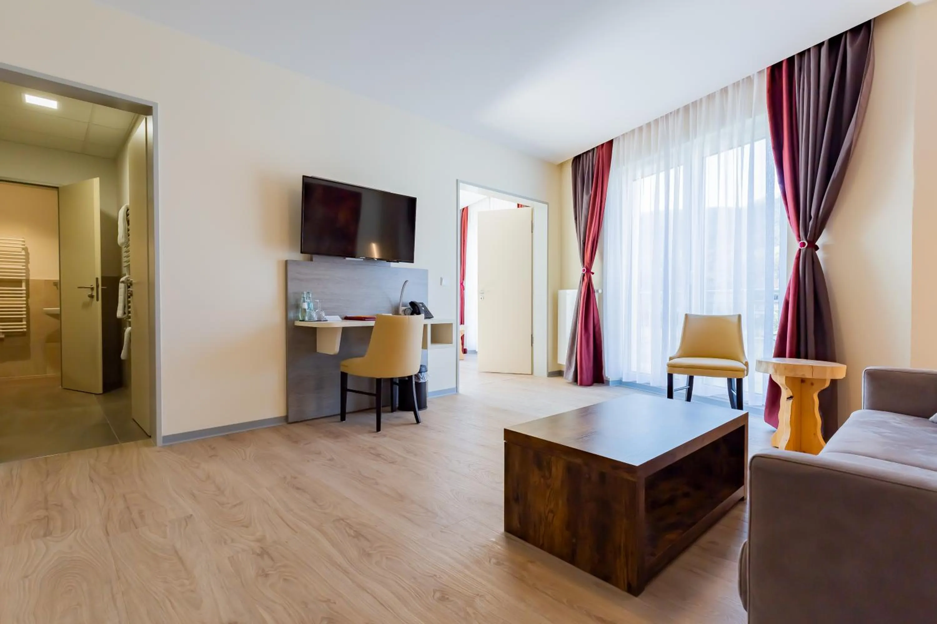 Living room, Bed in Mythenresort Heimdall