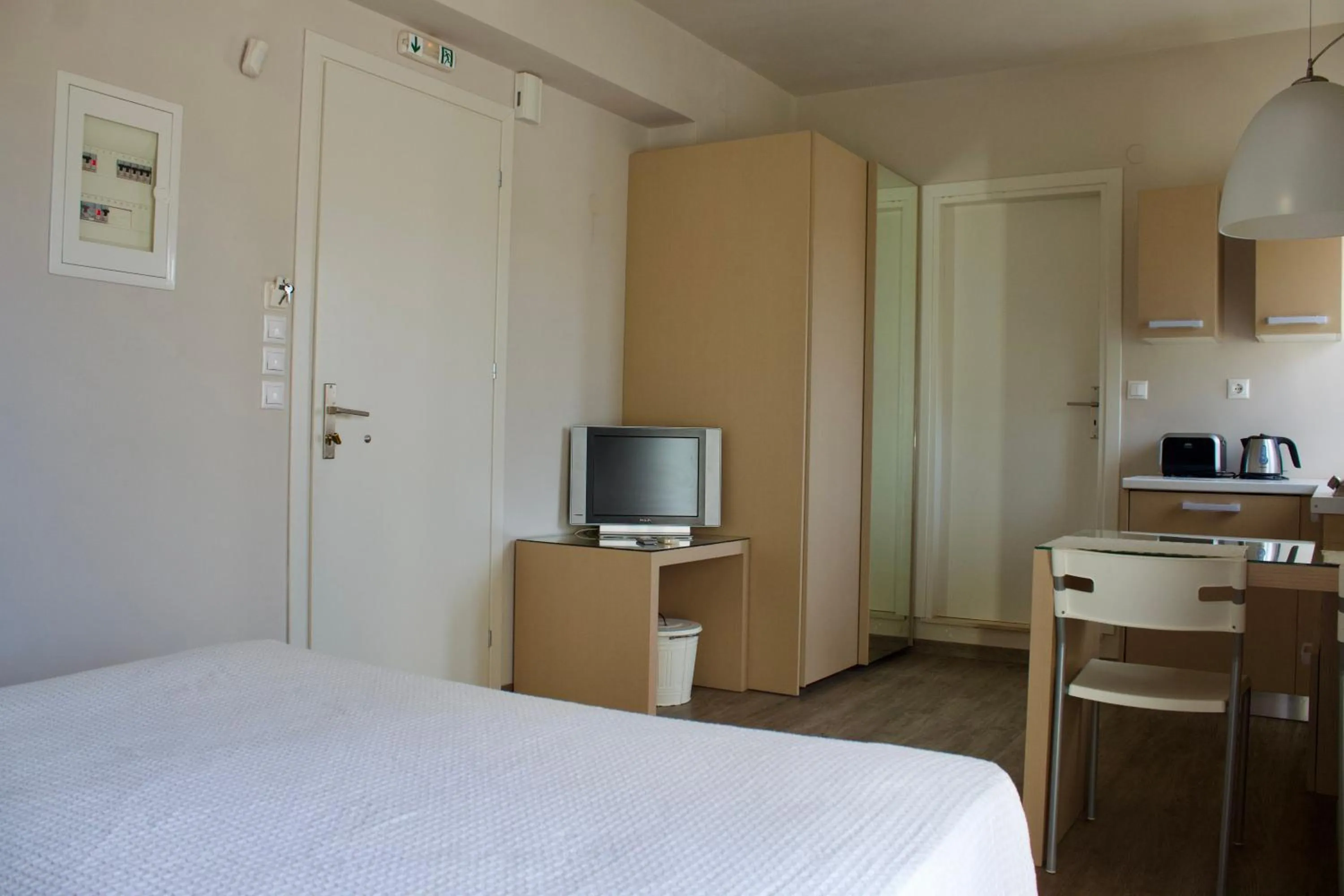 Photo of the whole room, Bed in Notos Luxury Studios