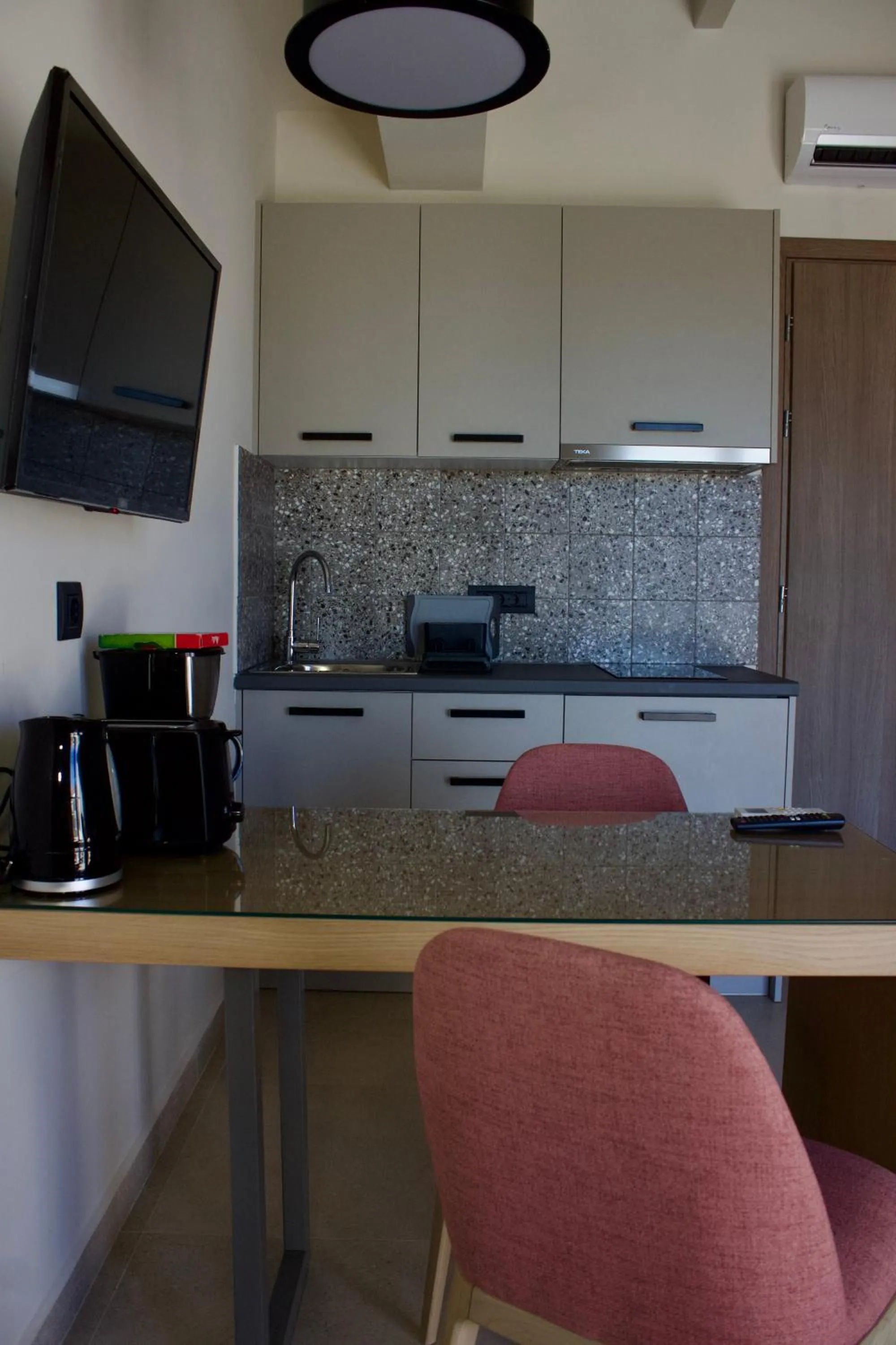 Kitchen or kitchenette in Notos Luxury Studios