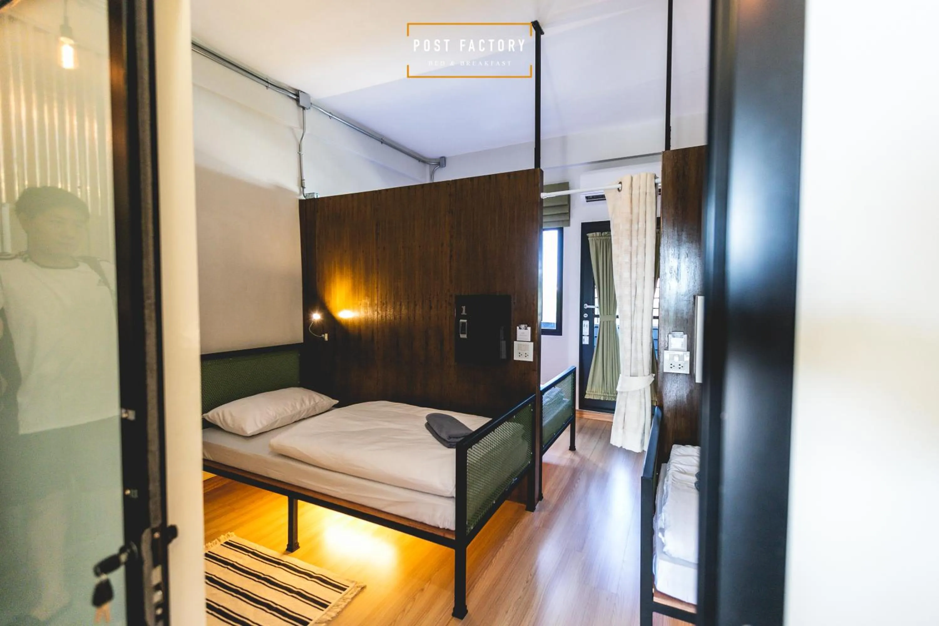 Bed in Post Factory Bed & Breakfast