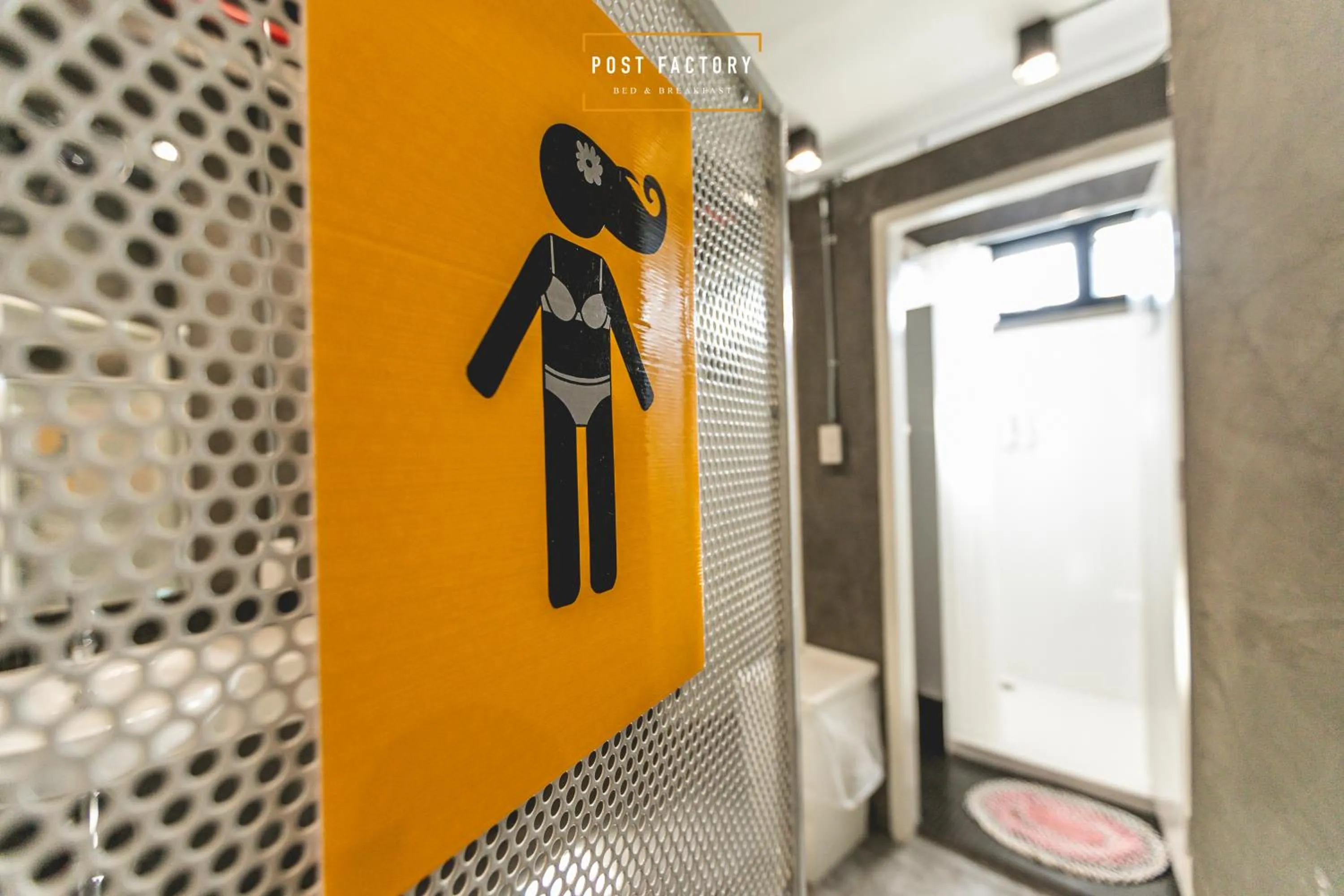 Logo/Certificate/Sign in Post Factory Bed & Breakfast