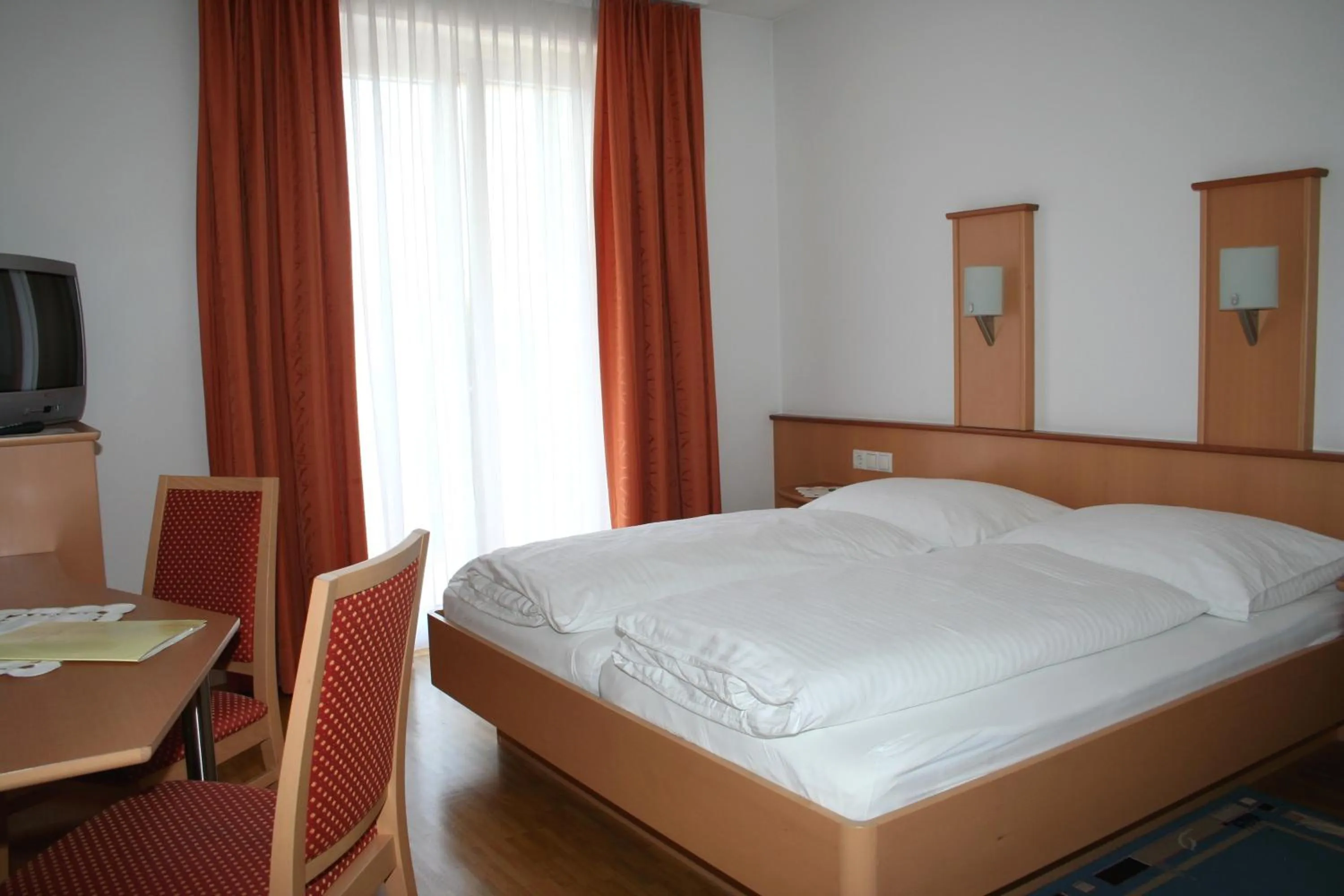 Bed in Hotel Cafe Lorenz