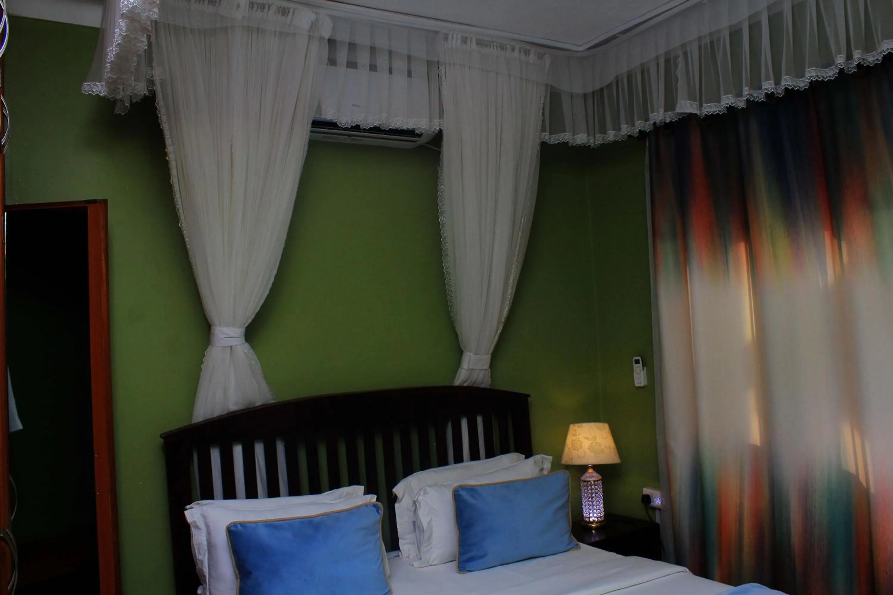 Bed in MAMIKKI Hotel Apartments