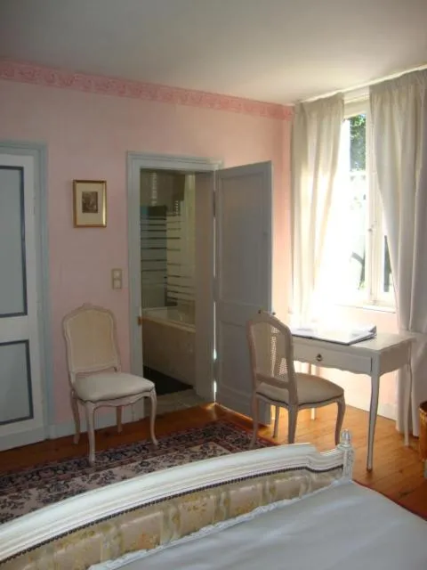 Bed in AU CHARME DES POMMIERS