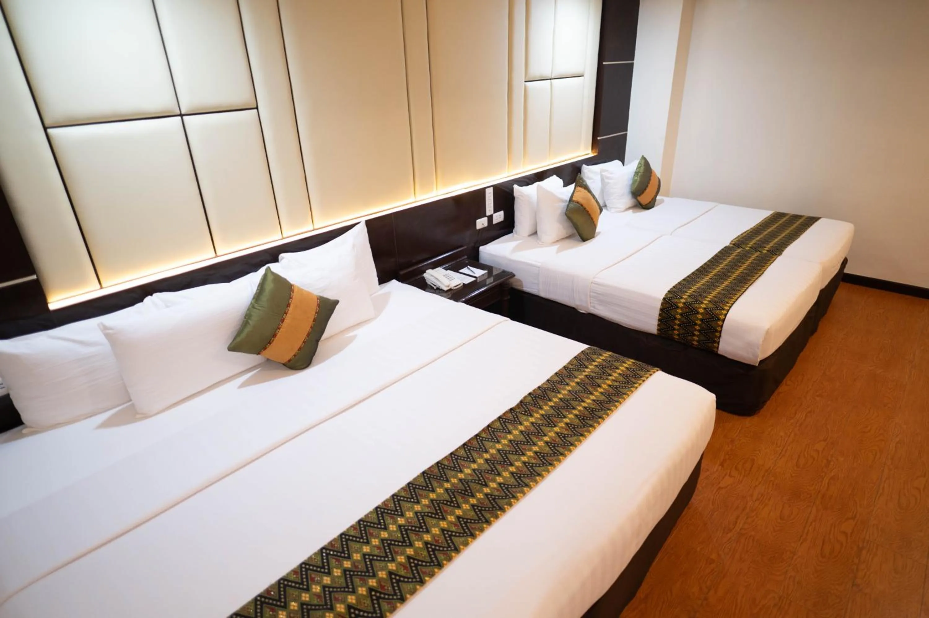 Bed in The Apo View Hotel