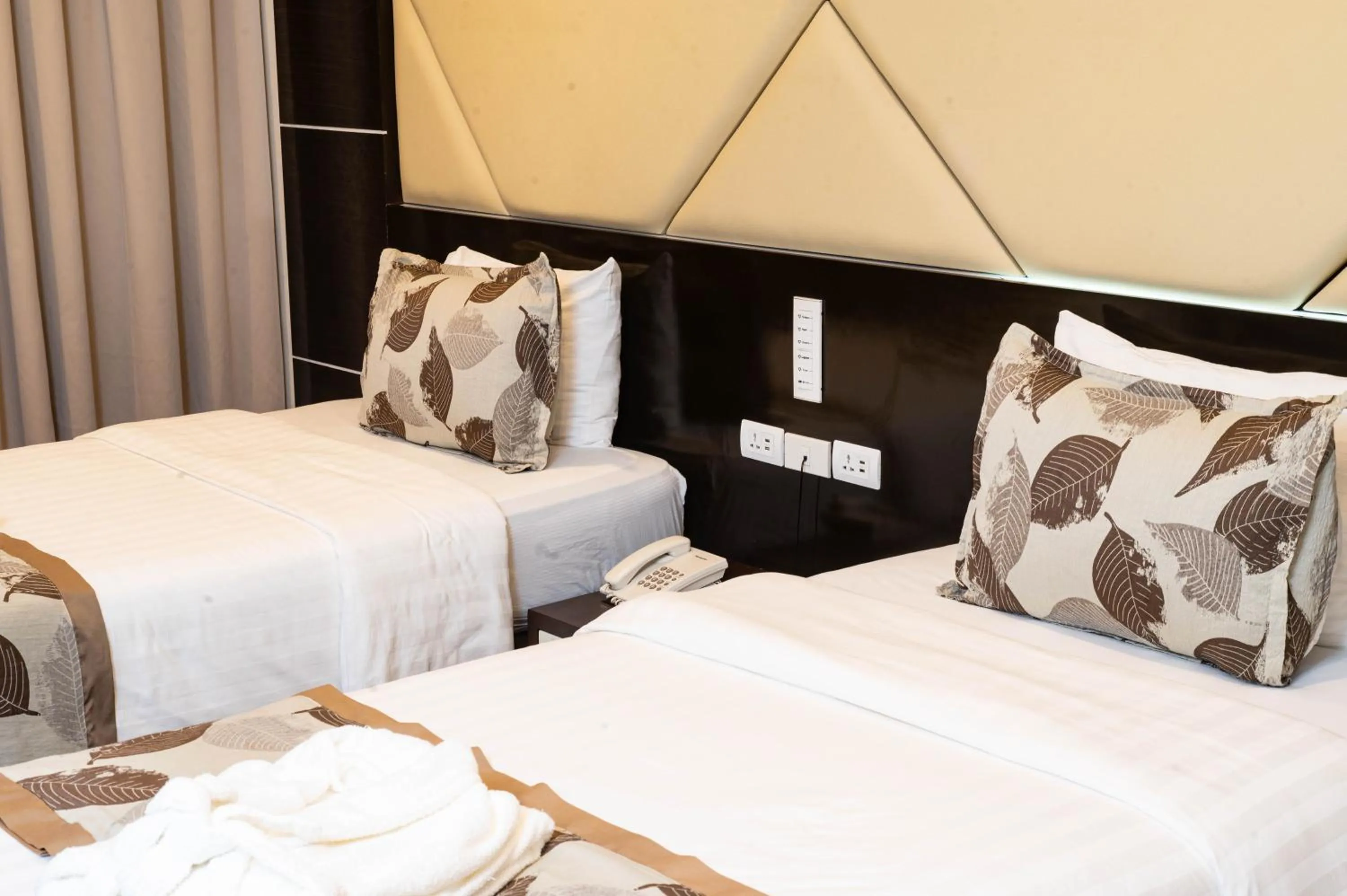 Bed in The Apo View Hotel