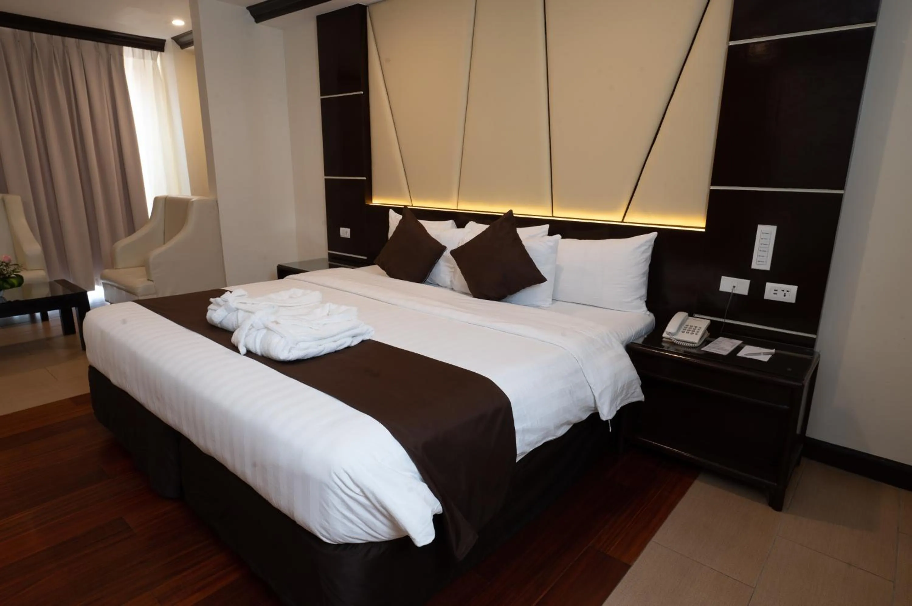 Bed in The Apo View Hotel