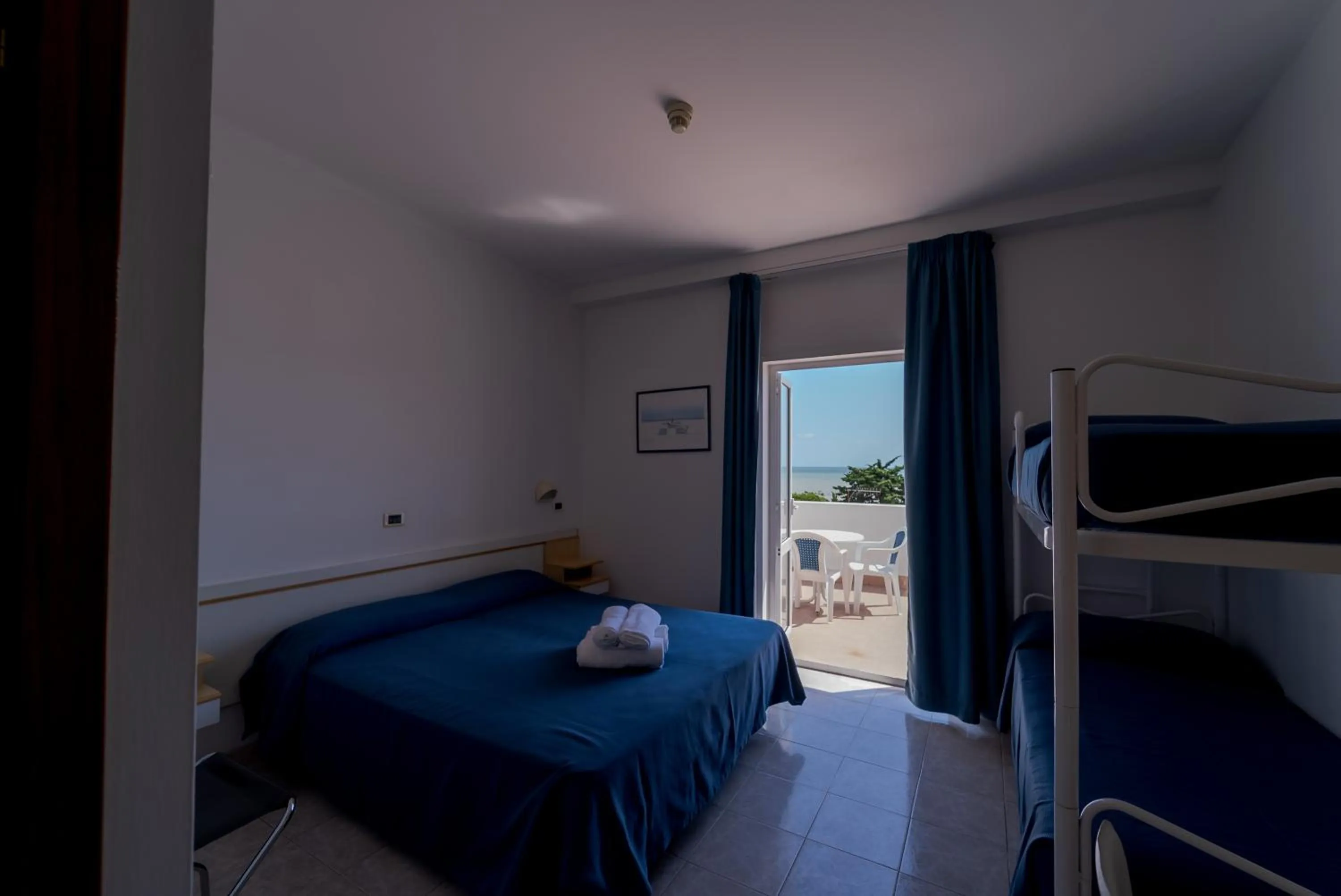 Photo of the whole room, Bed in Hotel Beach