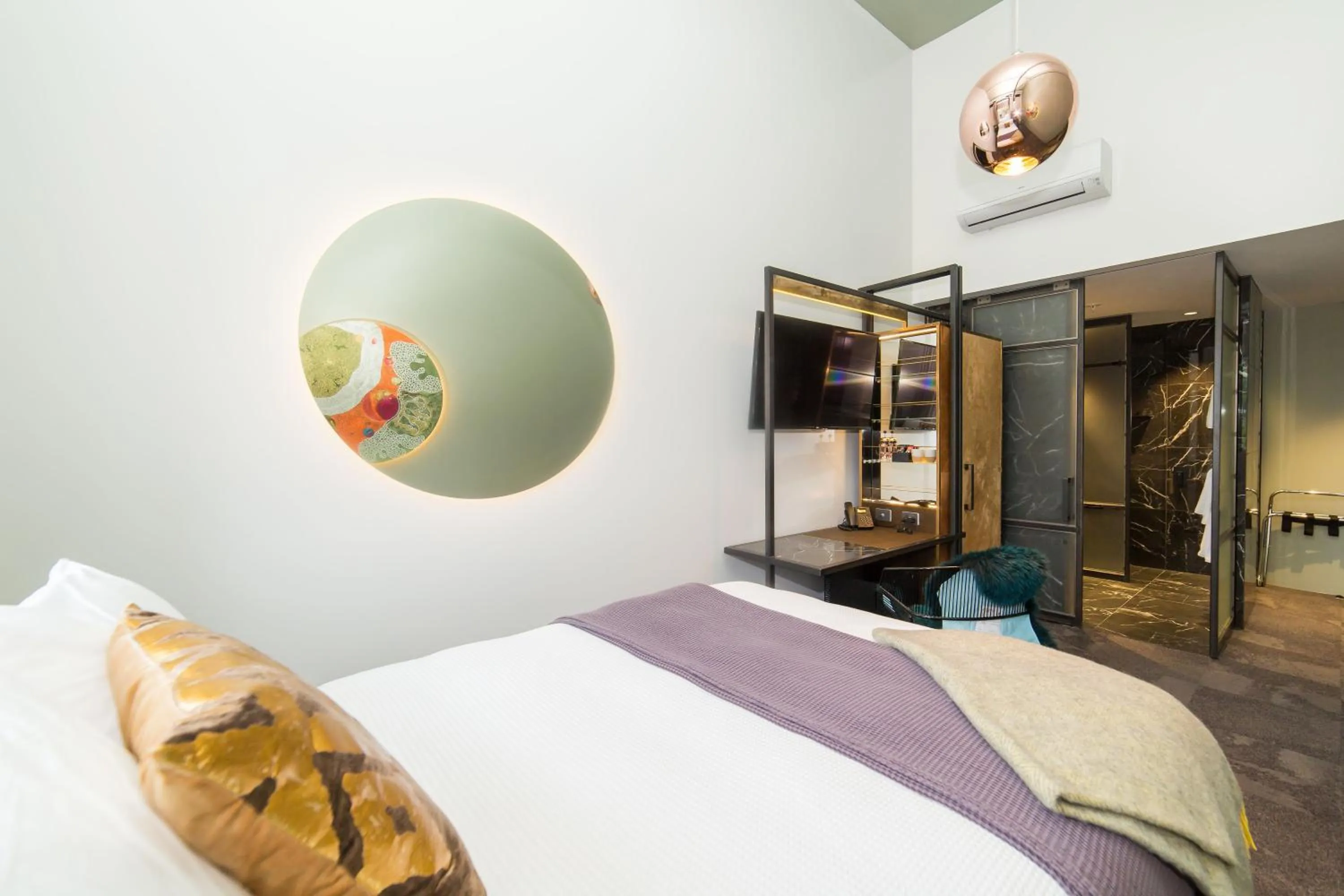 Bed in Clarence Boutique Hotel