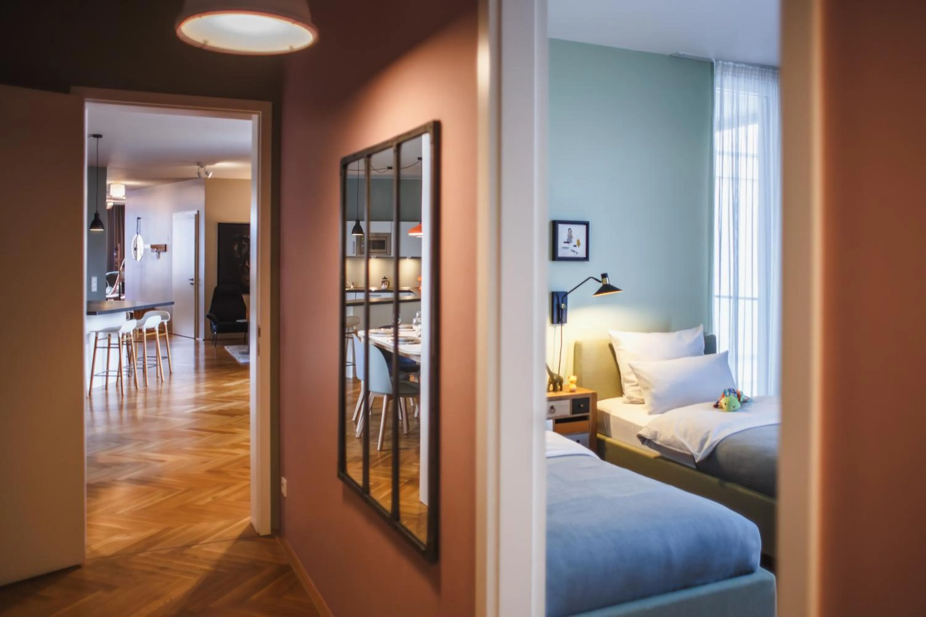 Living room, Bed in The Circus Apartments