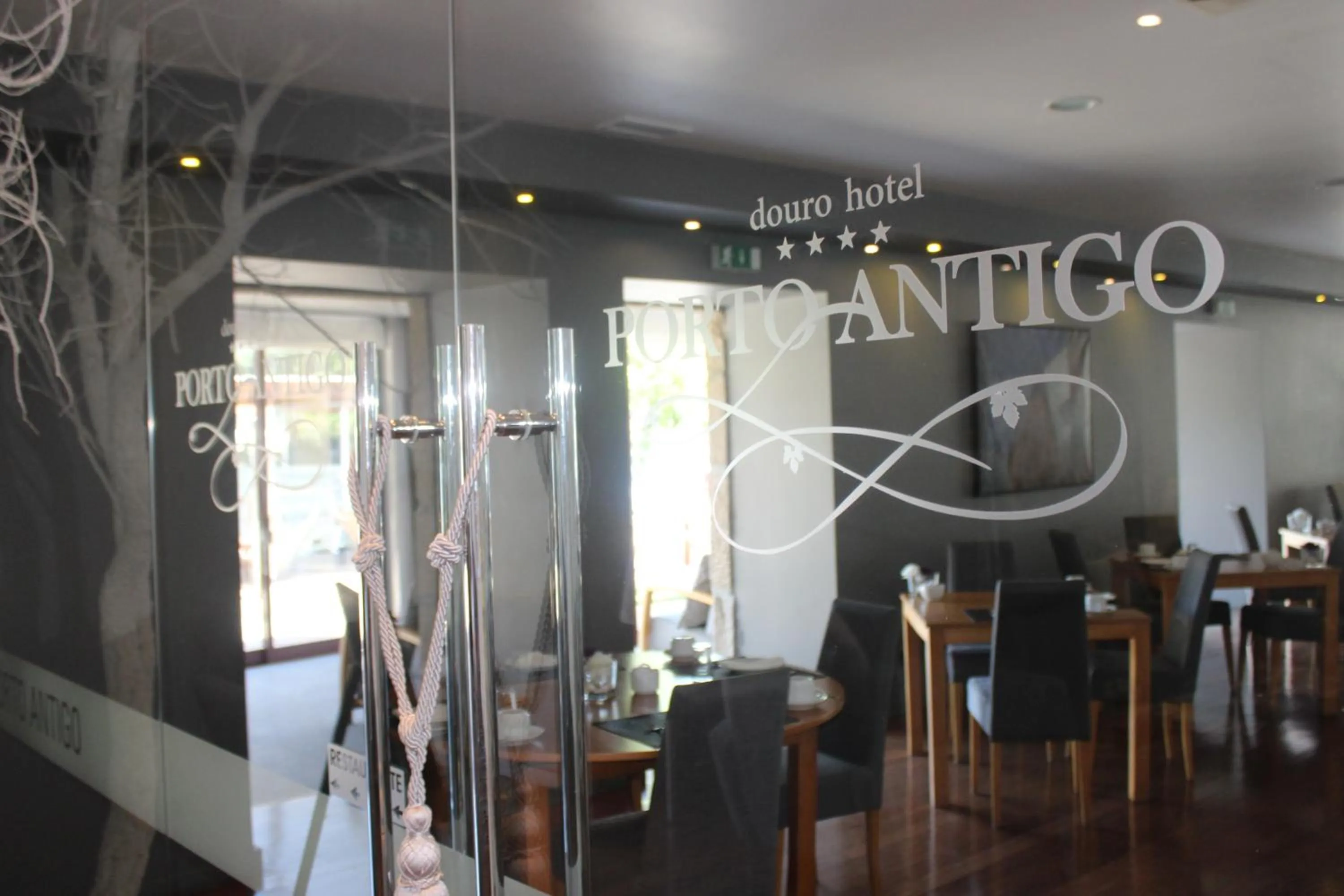 Property logo or sign in Douro Hotel Porto Antigo