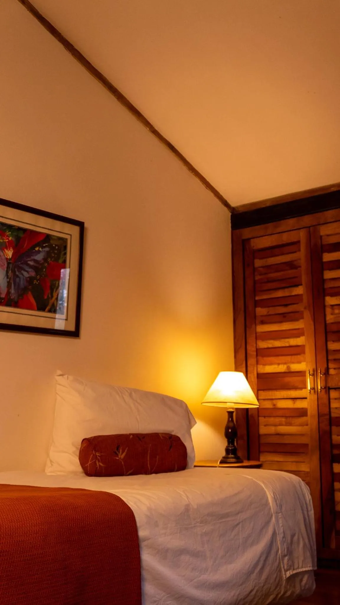 Bed in Poas Volcano Lodge