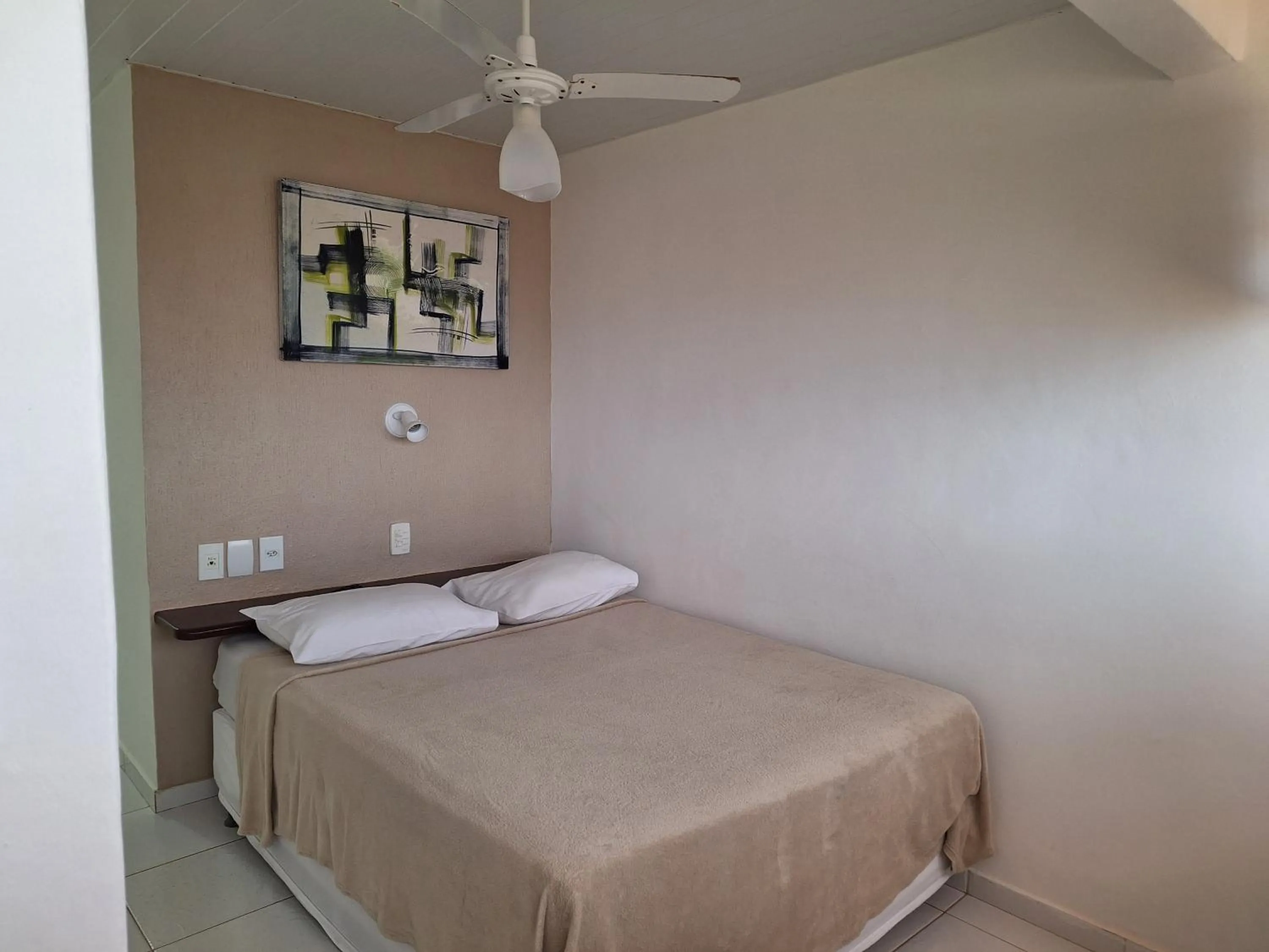 Bed in Pousada Areias Brancas