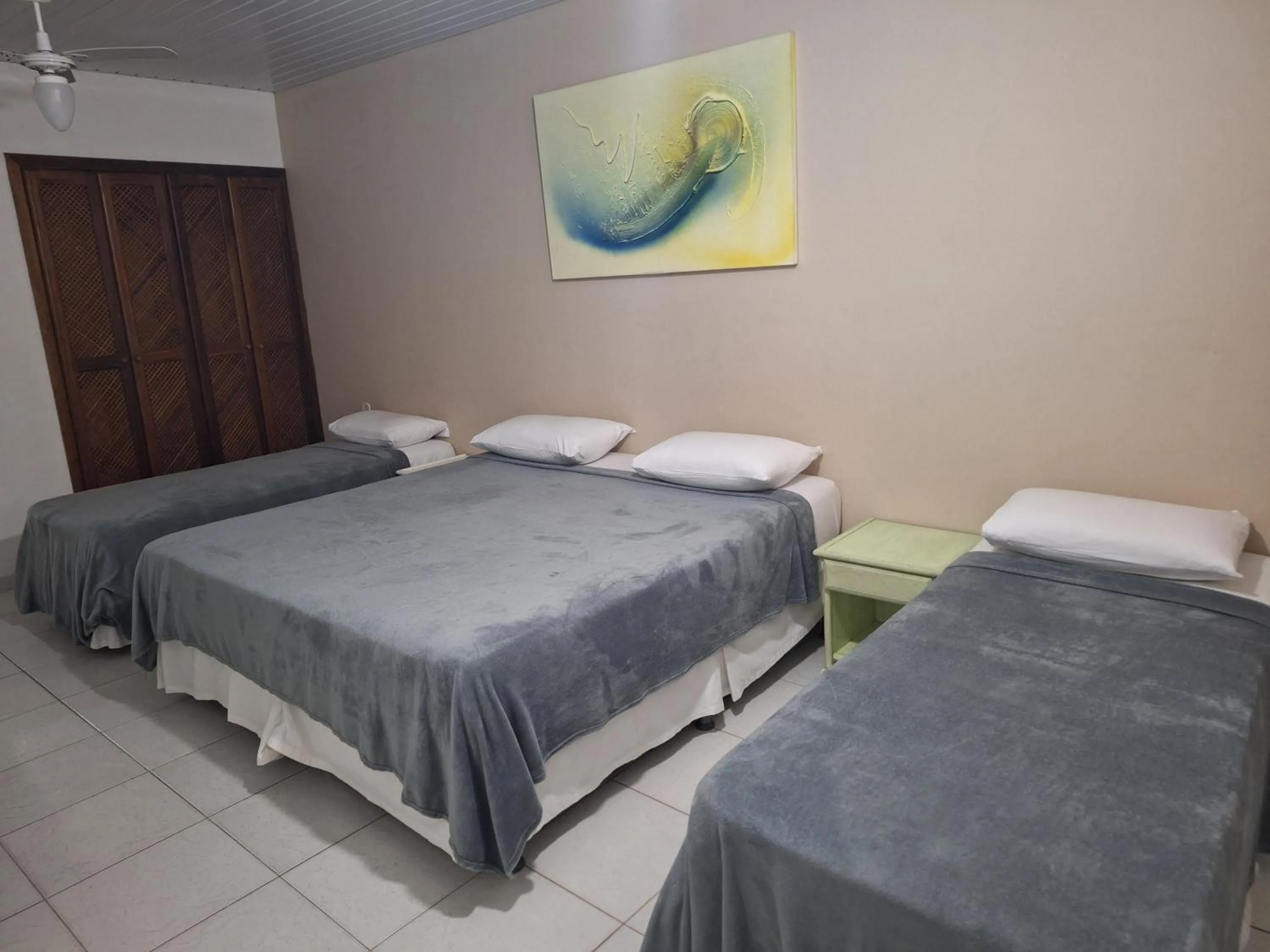 Bed in Pousada Areias Brancas