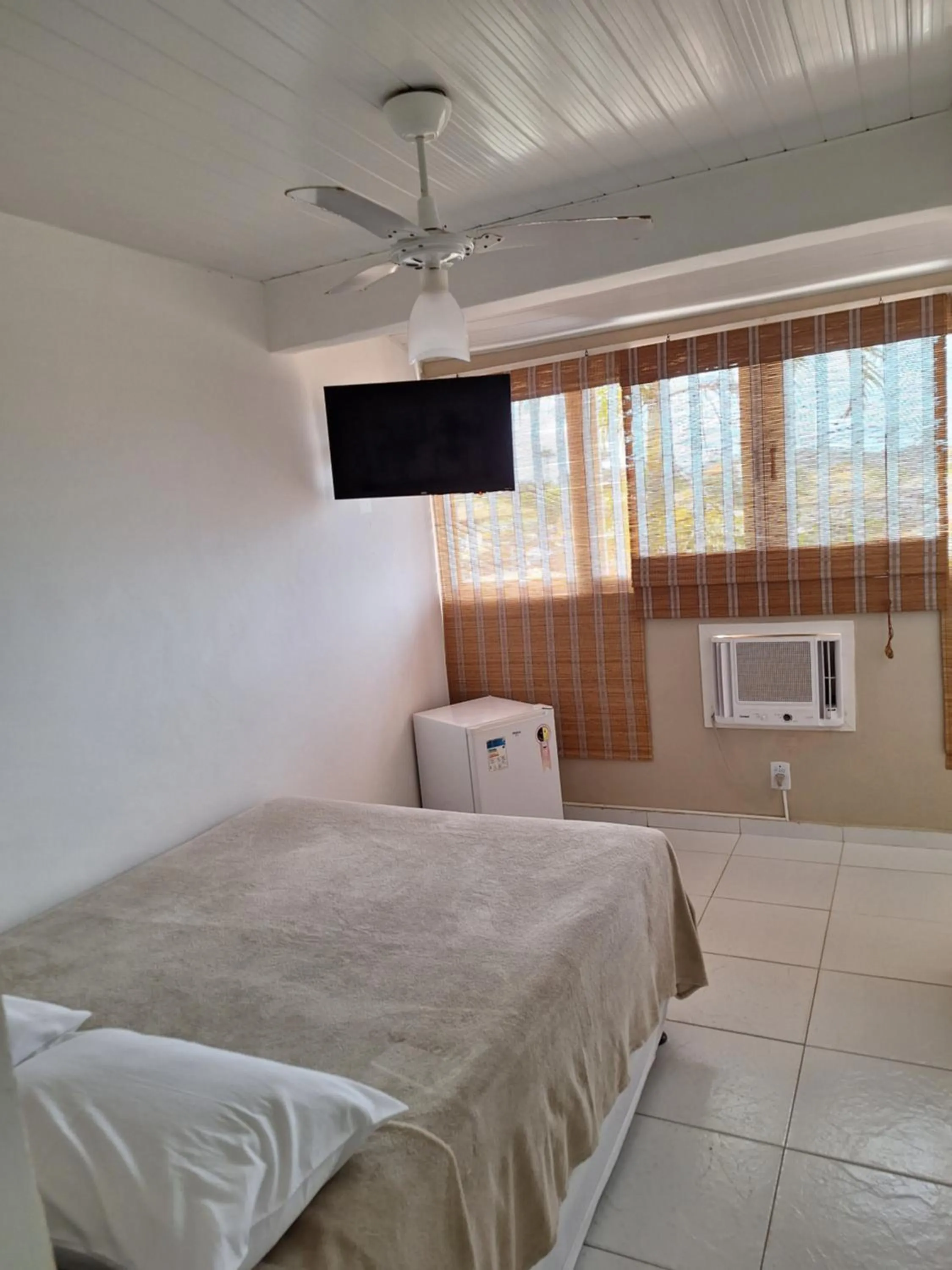 Bed in Pousada Areias Brancas