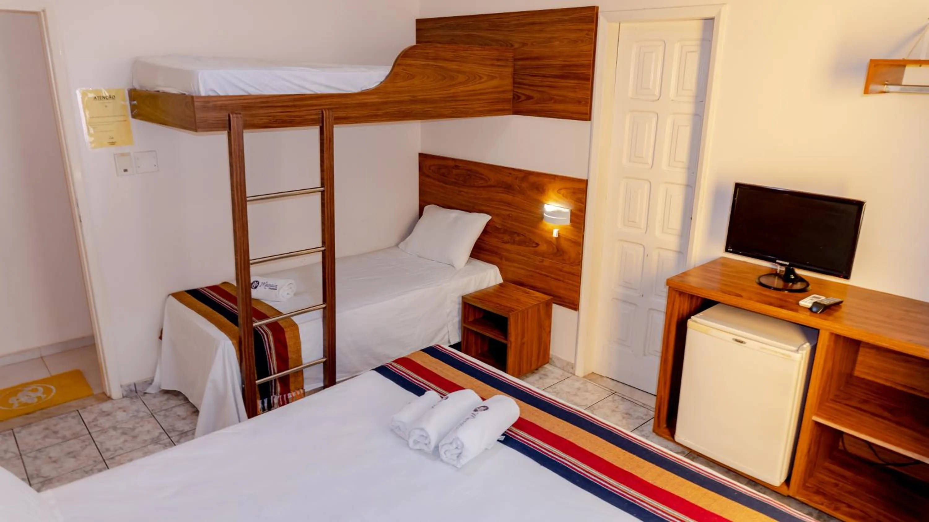 Bed in Pousada Manaia