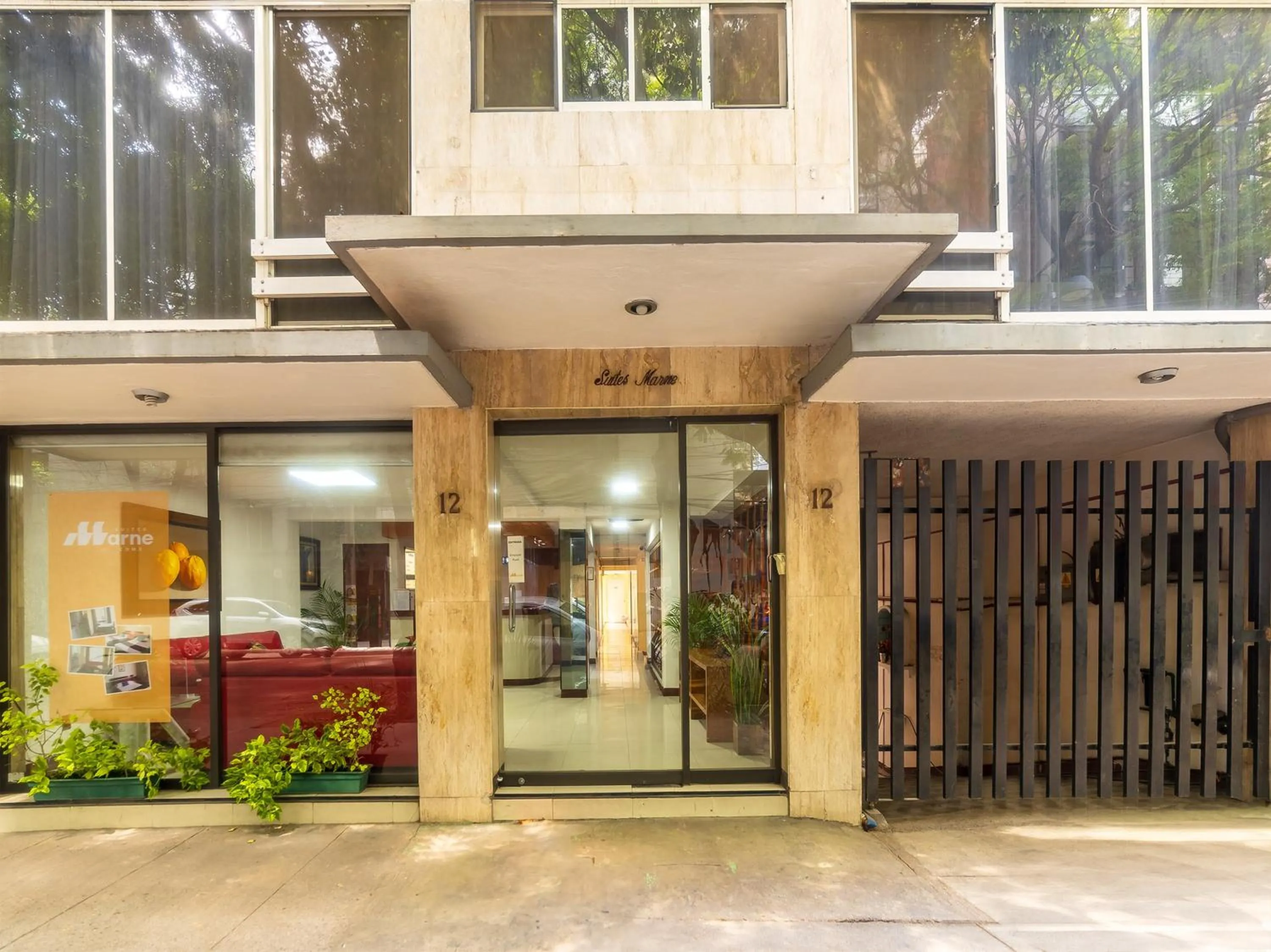 Facade/entrance in Capital O Hotel Suites Marne, Mexico City