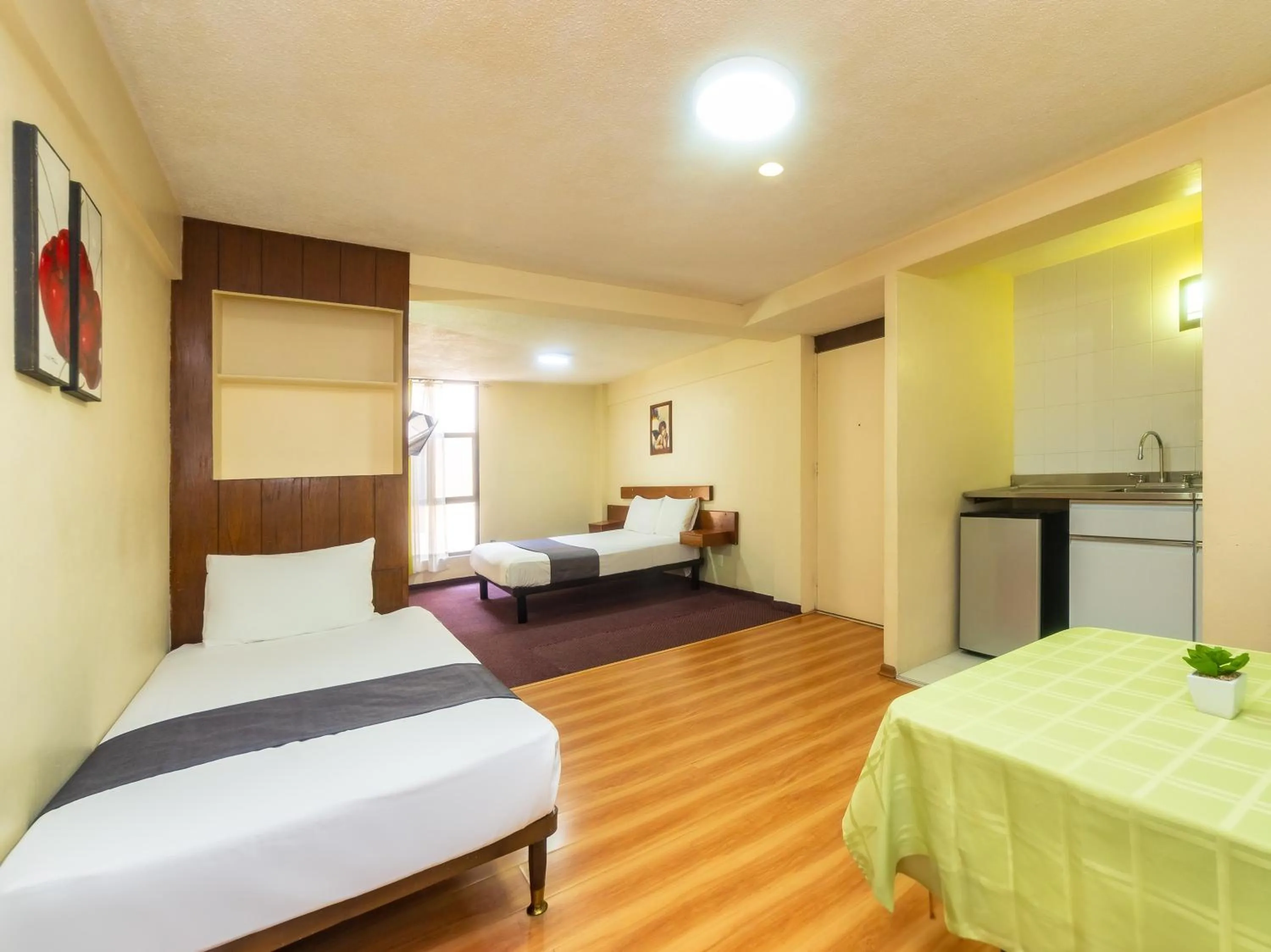 Bedroom, Bed in Capital O Hotel Suites Marne, Mexico City