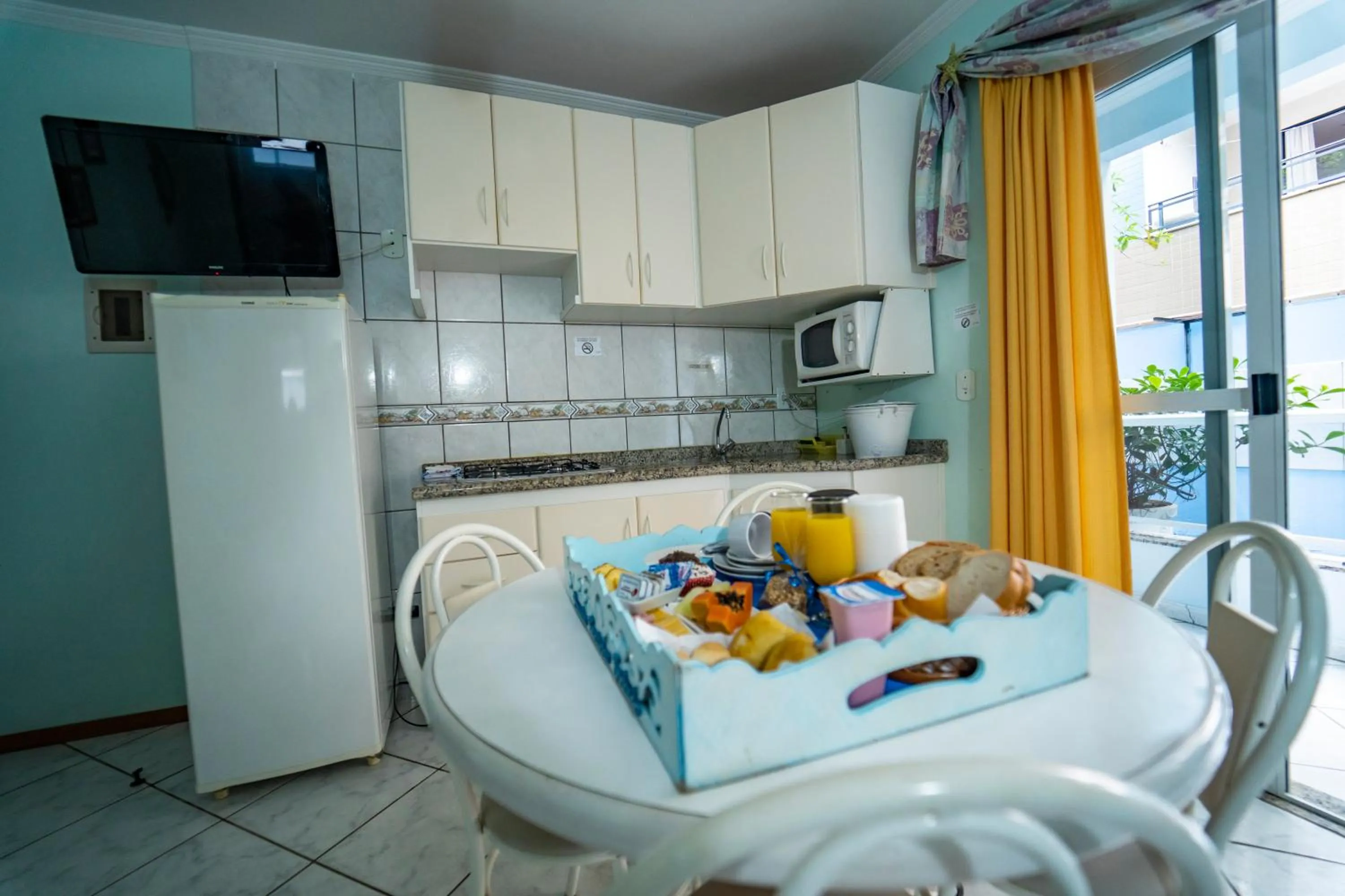 Kitchen or kitchenette in Pousada Cantinho Sonhado
