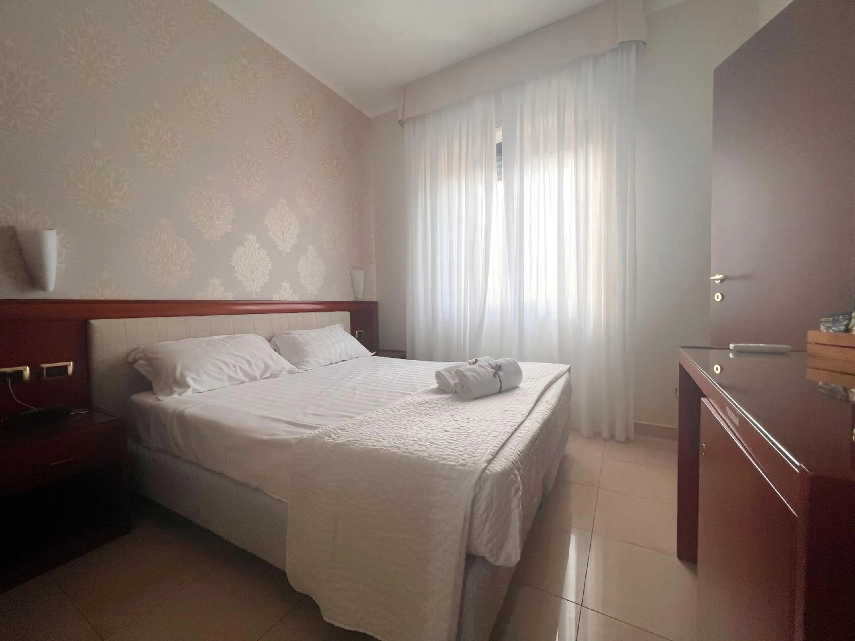 Bed in Hotel Paradiso