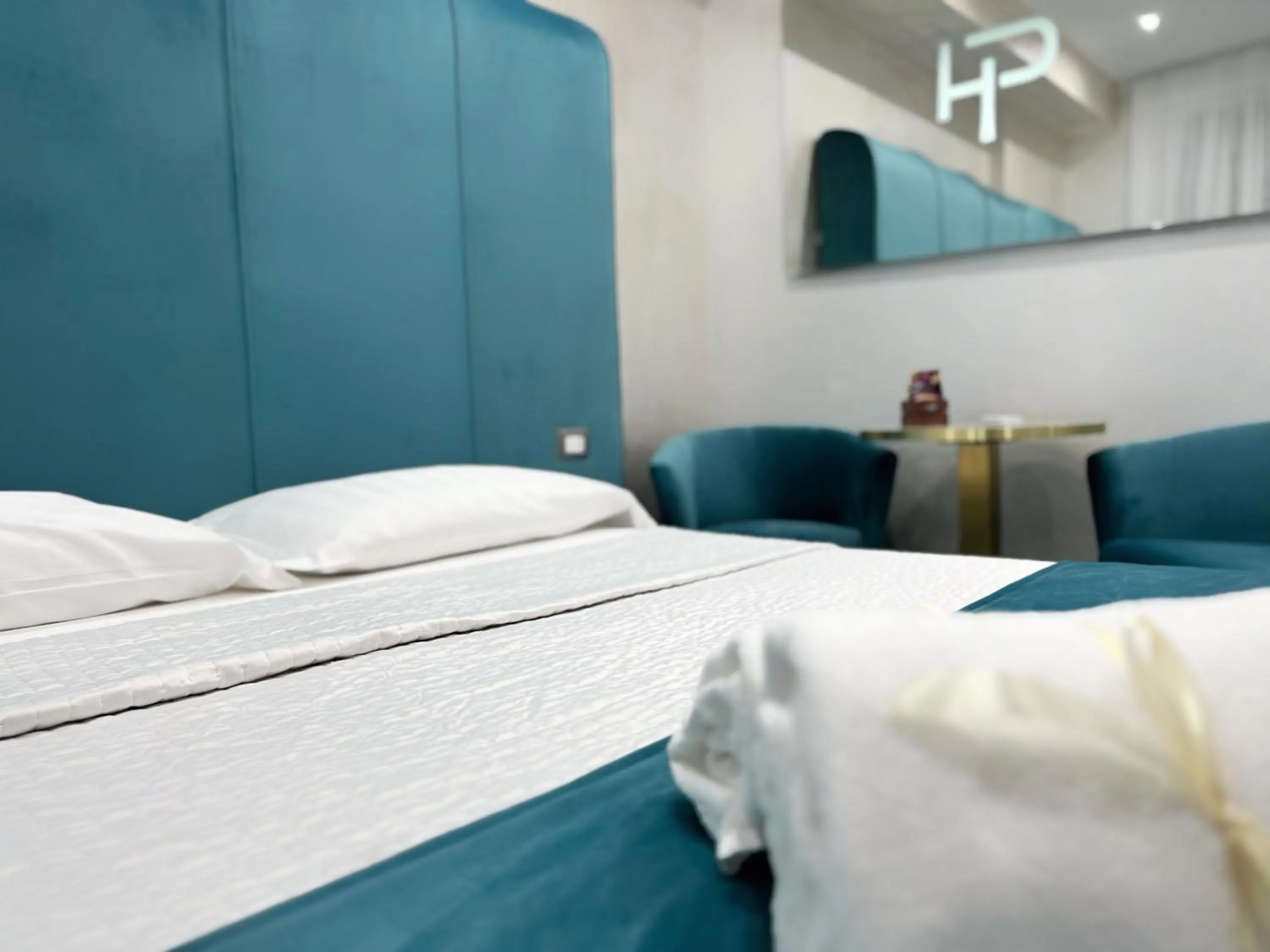 Bed in Hotel Paradiso