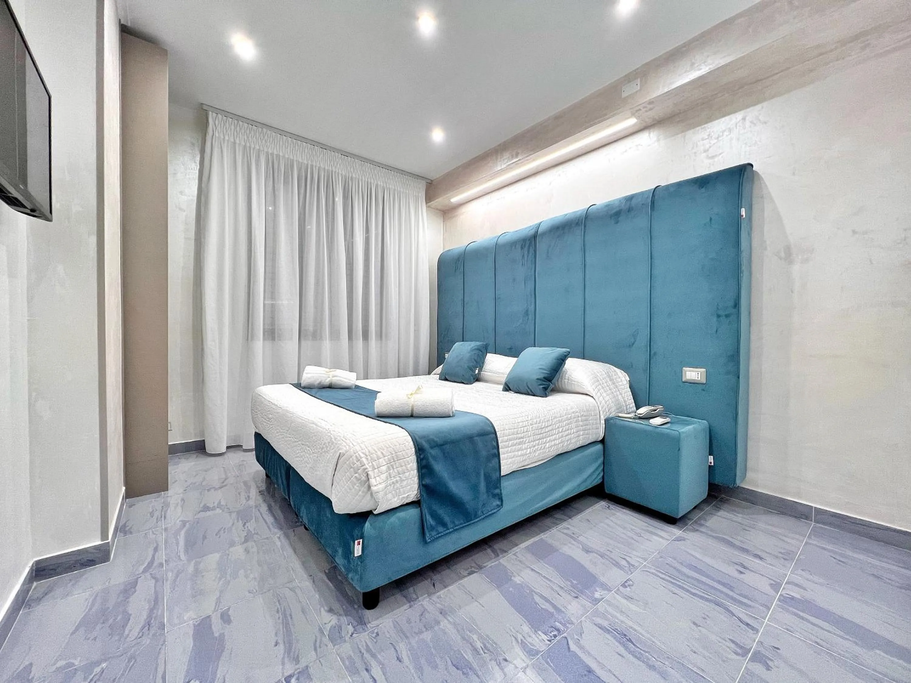 Bed in Hotel Paradiso