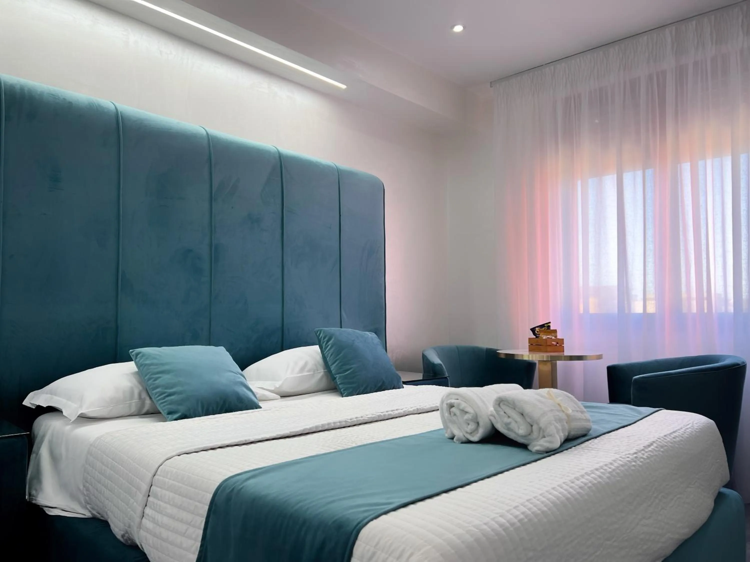 Bed in Hotel Paradiso