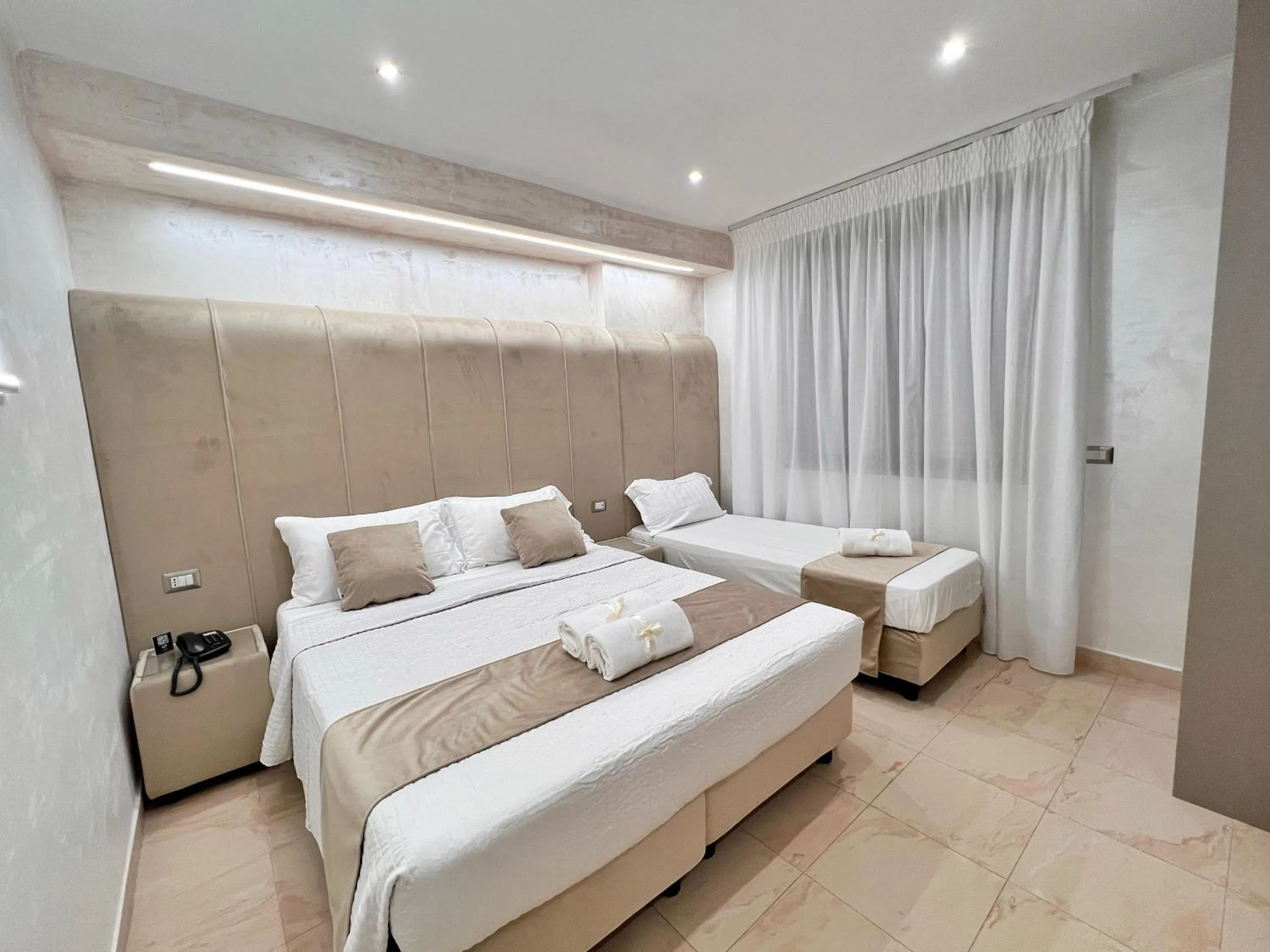 Bed in Hotel Paradiso