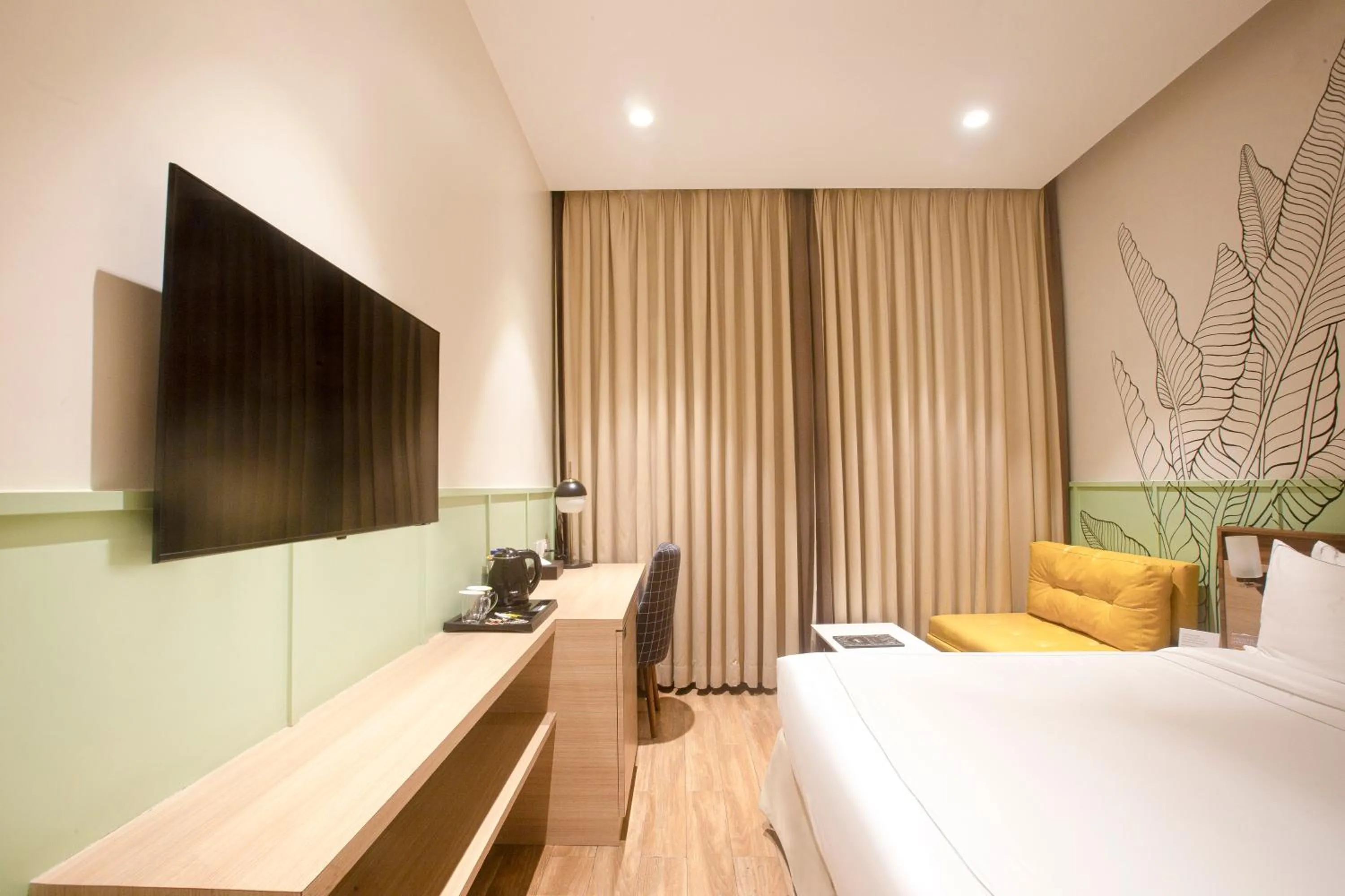 Bed in Hotel Bawa Regency