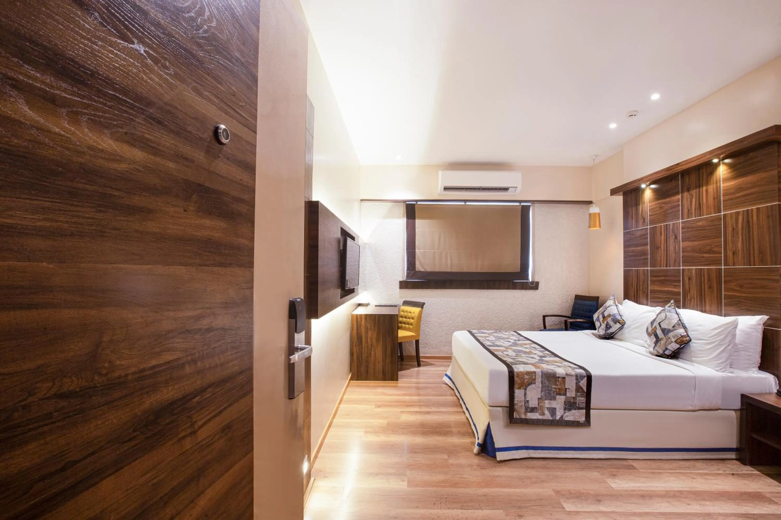 Bed in Hotel Bawa Regency