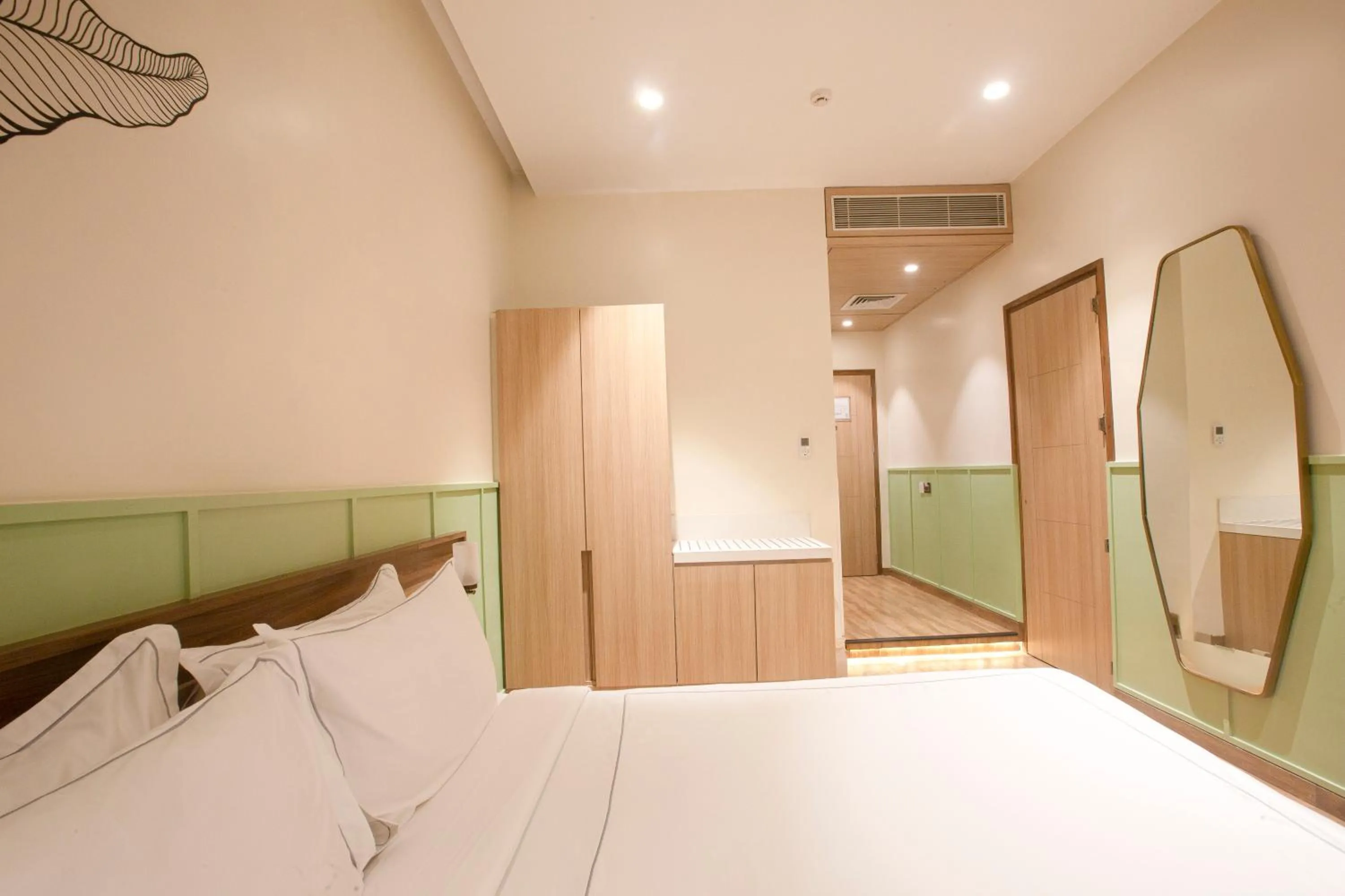 Bed in Hotel Bawa Regency