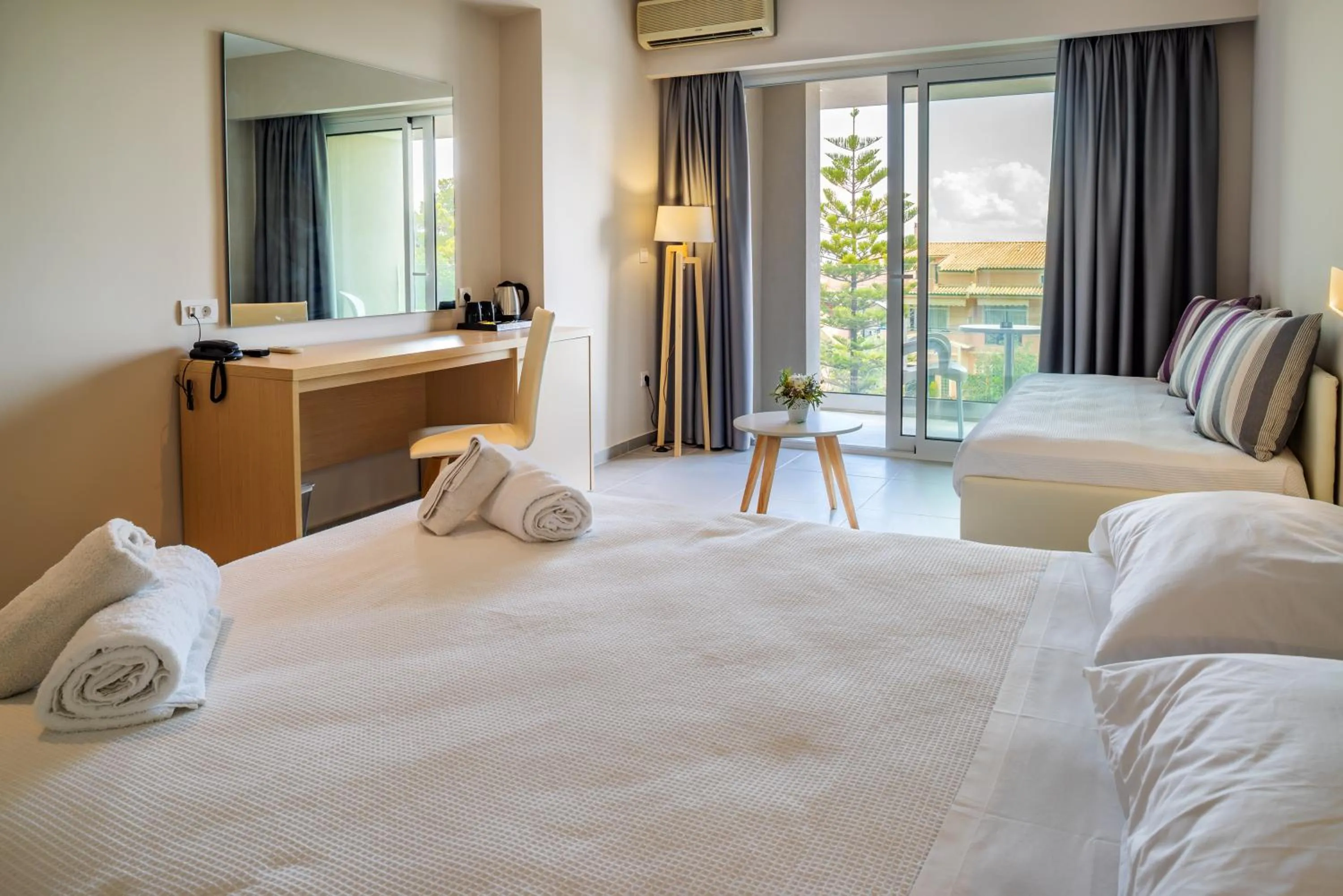 Bed in CNic Gemini Hotel