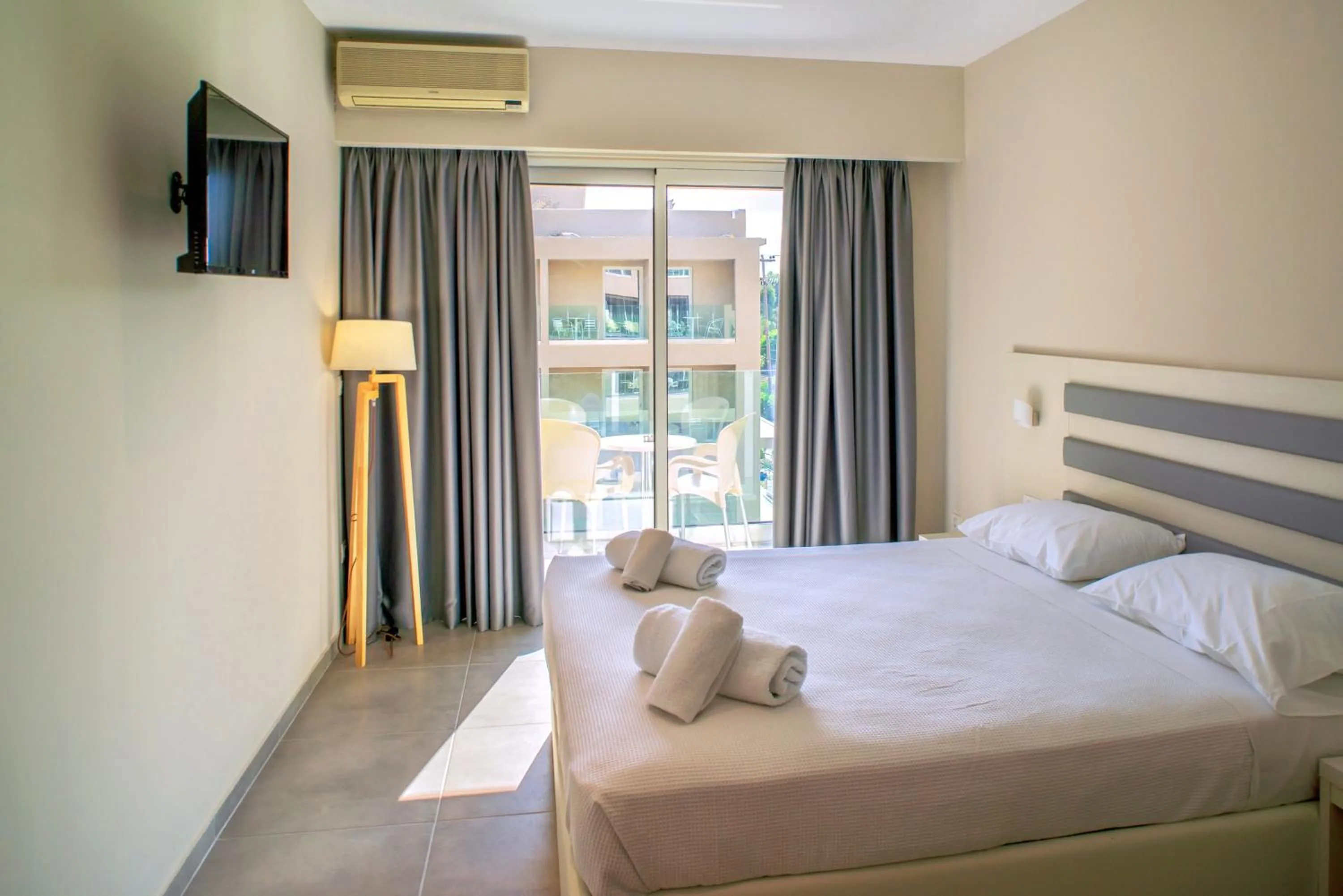 Bed in CNic Gemini Hotel