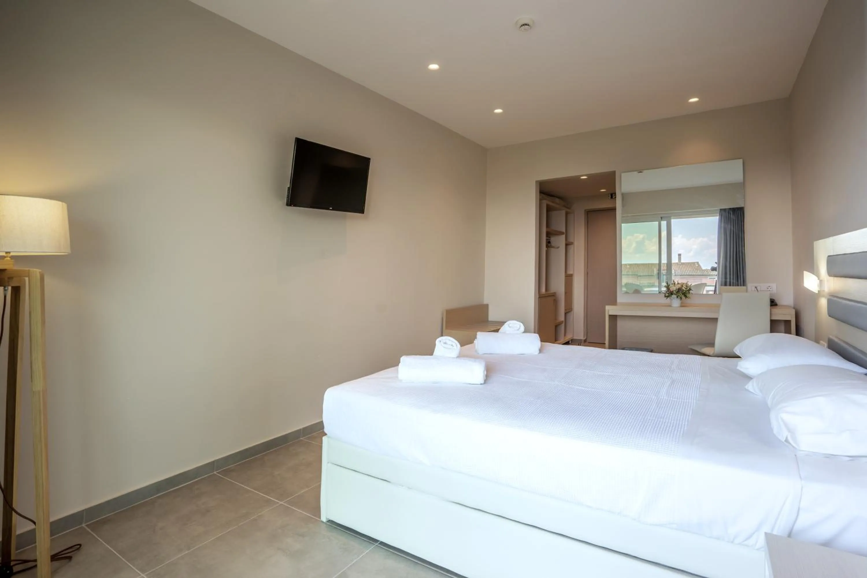 Bed in CNic Gemini Hotel